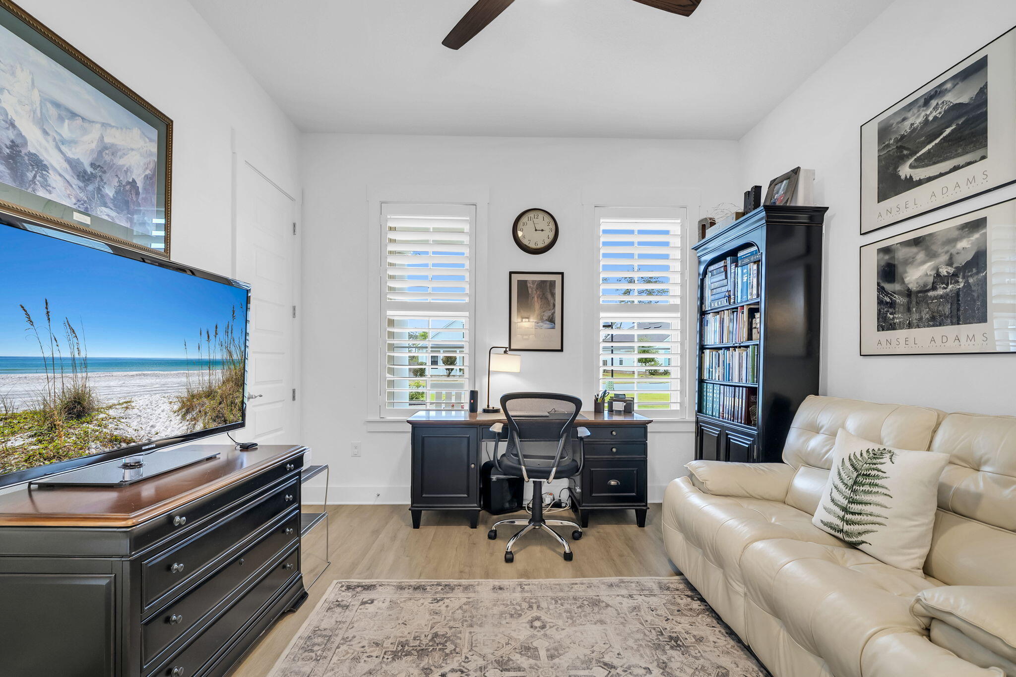 1166 Deer Moss Loop Niceville, FL 32578 - Photo 34 of 46 a living room with furniture flat screen tv and window