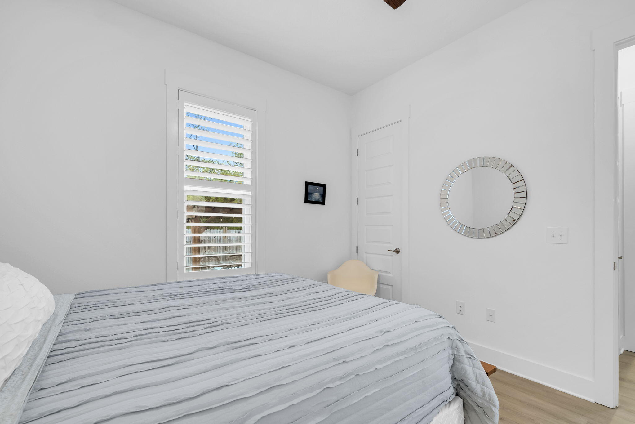 1166 Deer Moss Loop Niceville, FL 32578 - Photo 36 of 46 a bedroom with a bed and a window