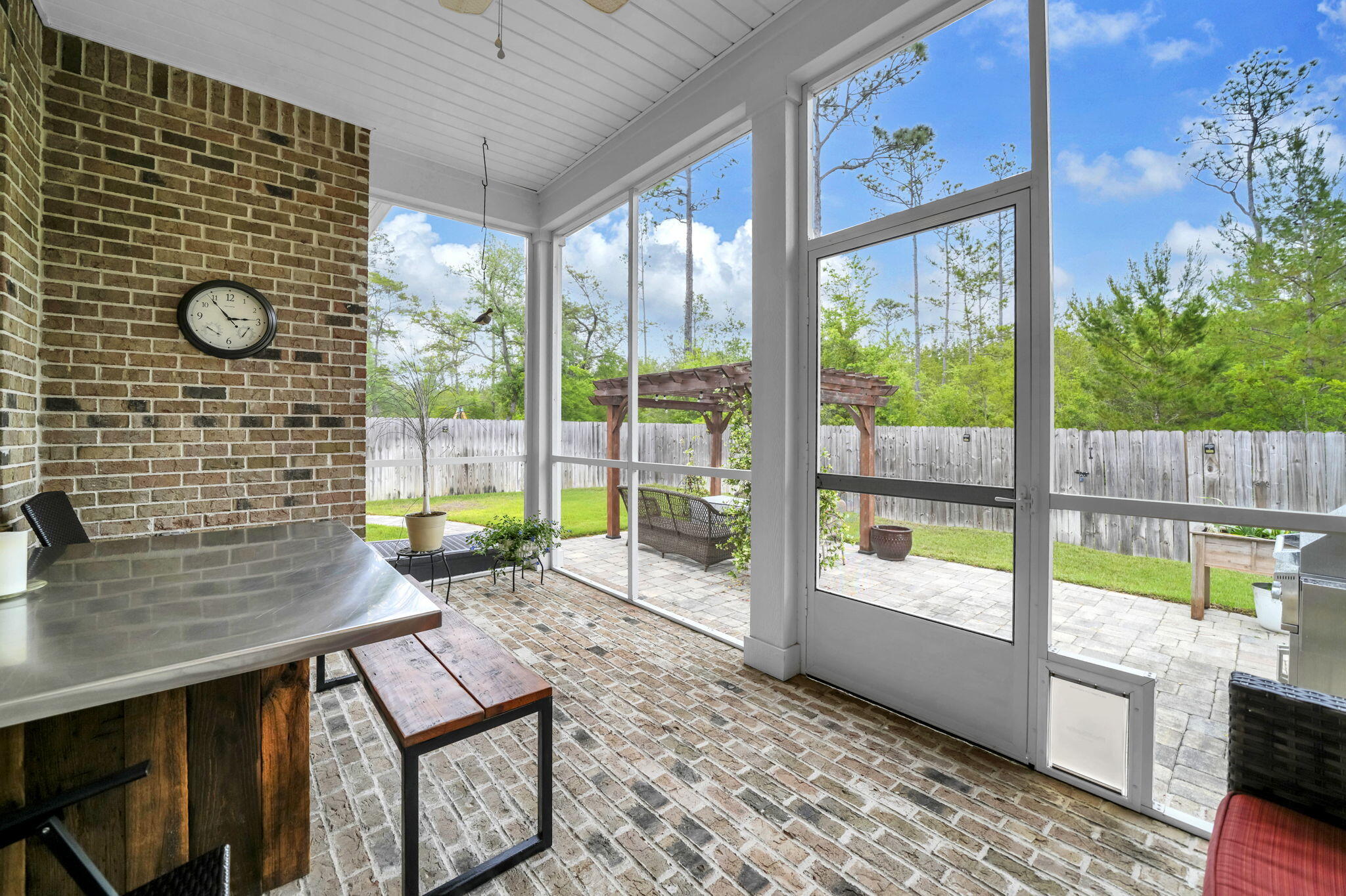 1166 Deer Moss Loop Niceville, FL 32578 - Photo 42 of 46 Screened porch
