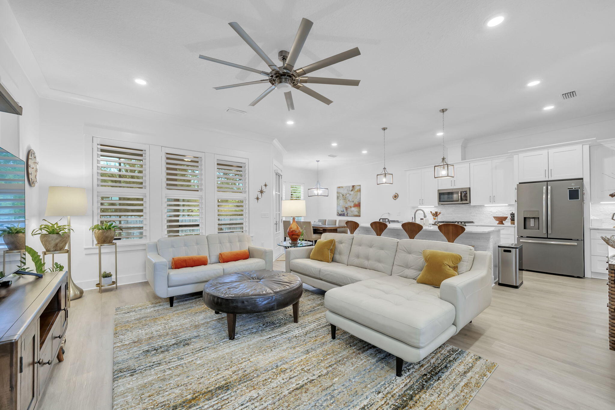 1166 Deer Moss Loop Niceville, FL 32578 - Photo 9 of 46 a living room with furniture and a large window