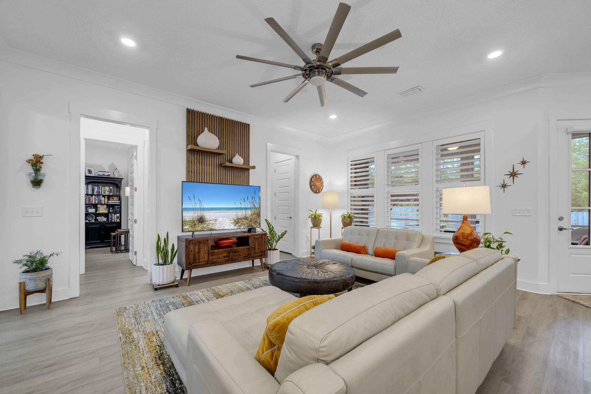 1166 Deer Moss Loop Niceville, FL 32578 - Photo 10 of 46 a living room with furniture fireplace and a window