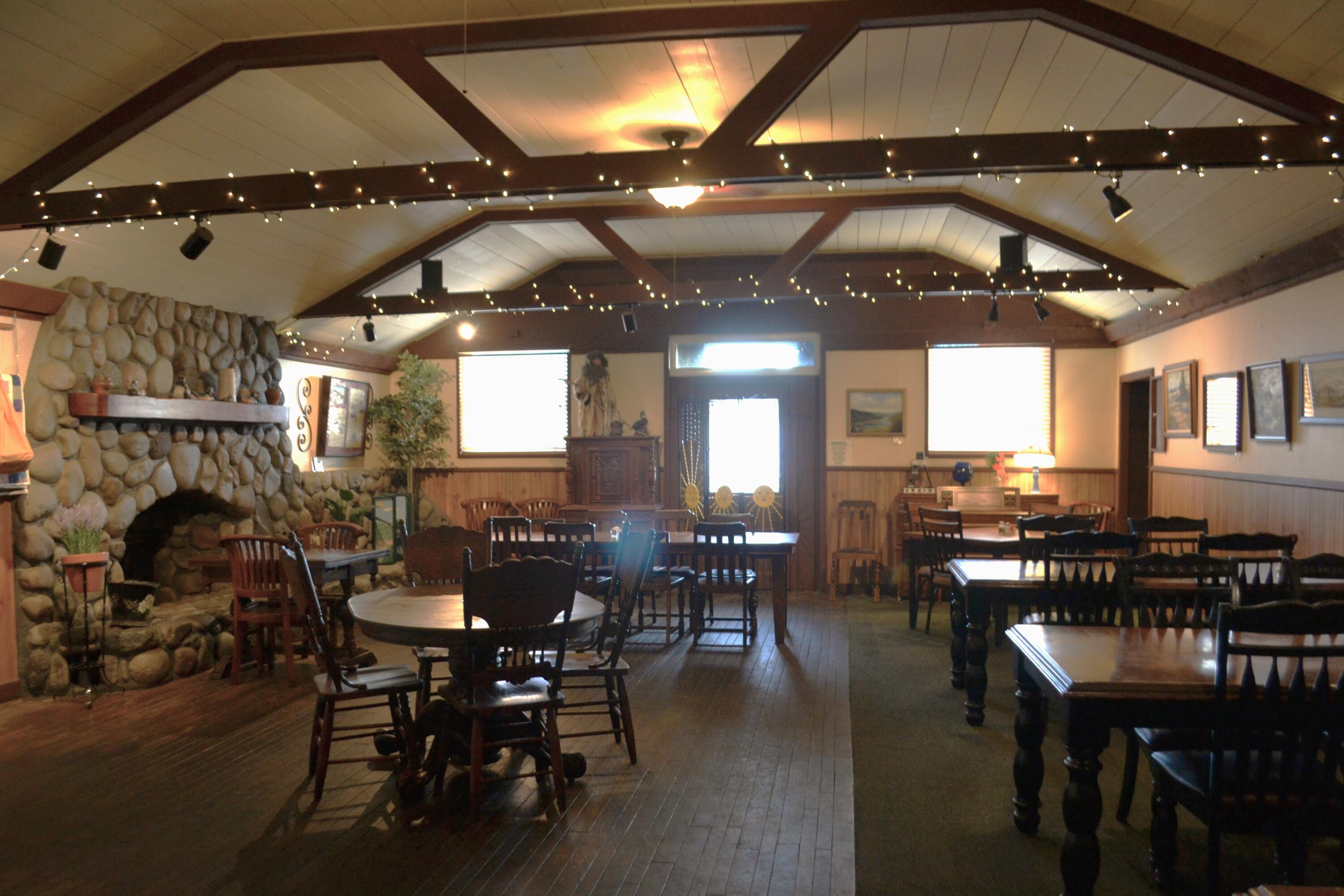 24860 Main Street Fall River Mills, CA 96028 - Photo 11 of 50 a view of a dining area with furniture and chandelier