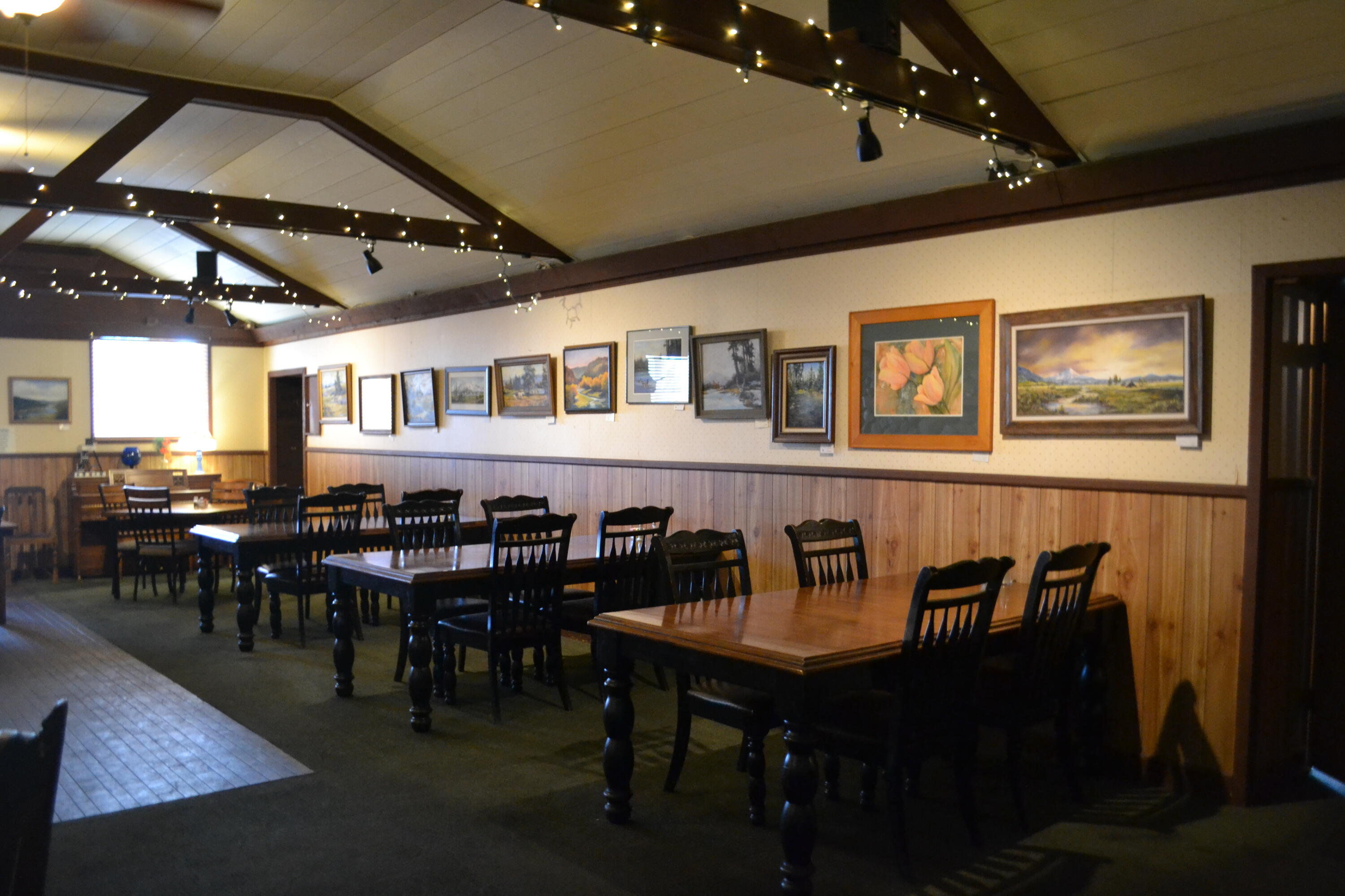 24860 Main Street Fall River Mills, CA 96028 - Photo 13 of 50 a view of a dining room with furniture and chandelier