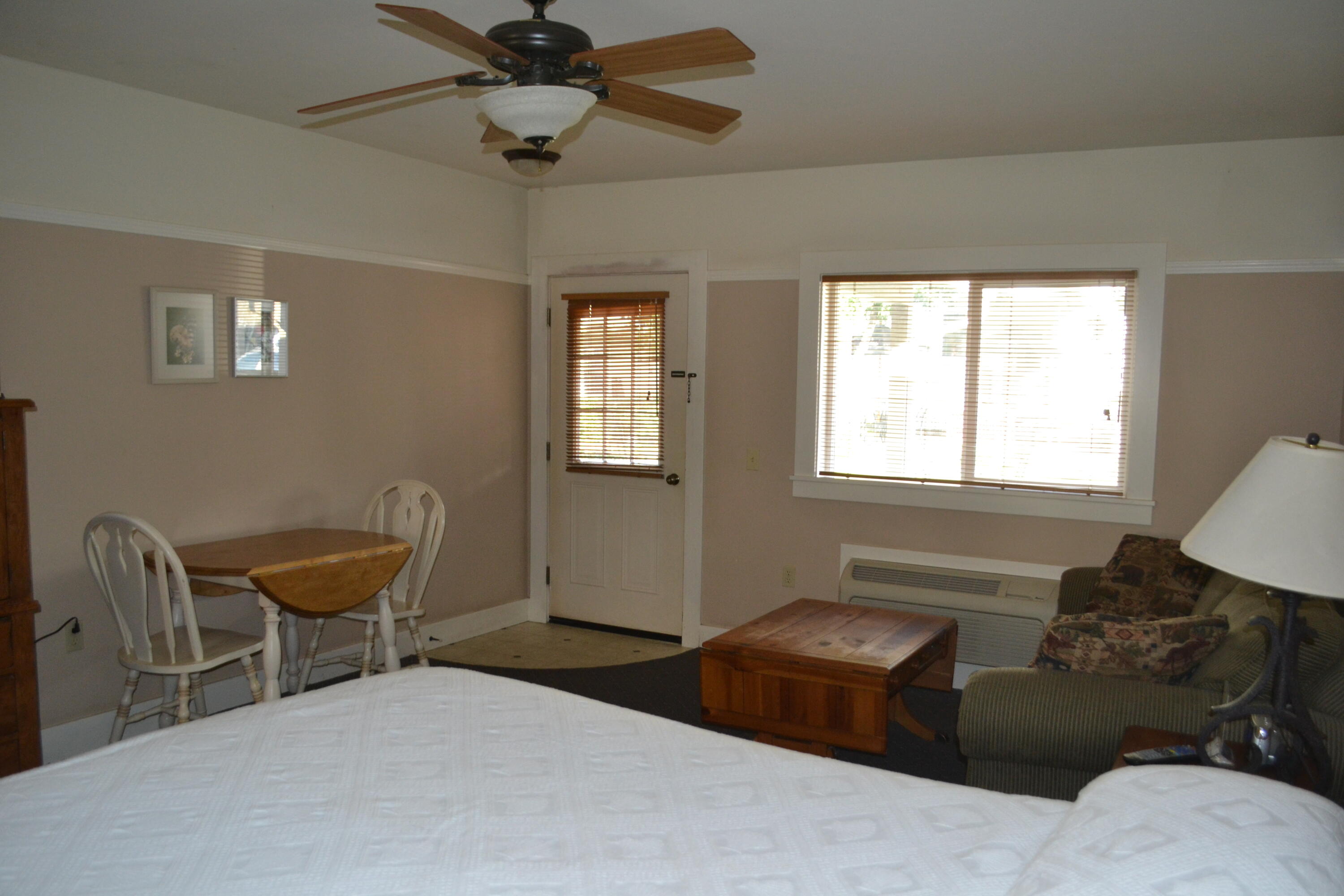 24860 Main Street Fall River Mills, CA 96028 - Photo 22 of 50 a bedroom with furniture and a window