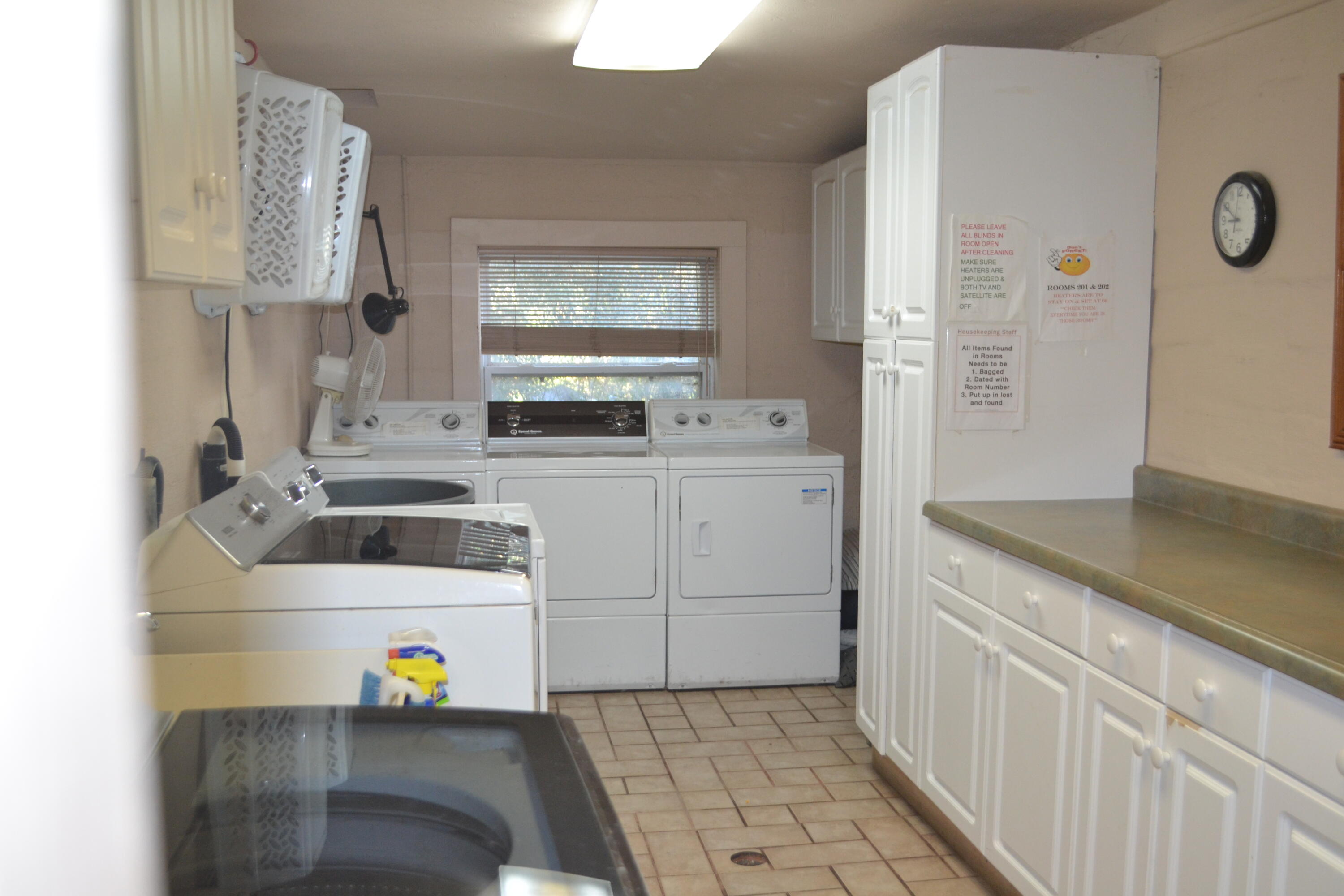 24860 Main Street Fall River Mills, CA 96028 - Photo 28 of 50 a kitchen with stainless steel appliances a stove a sink and a refrigerator
