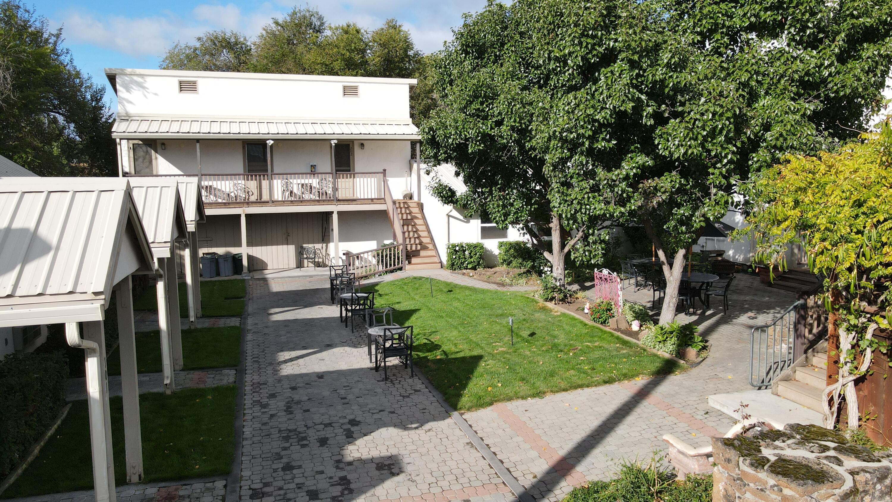 24860 Main Street Fall River Mills, CA 96028 - Photo 35 of 50 a view of a house with a patio