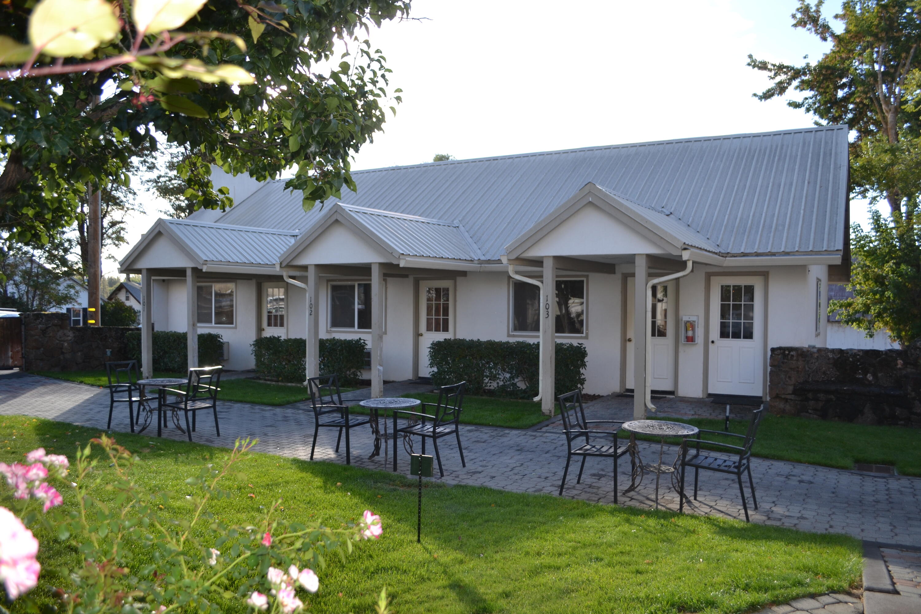 24860 Main Street Fall River Mills, CA 96028 - Photo 4 of 50 a view of a house with a patio