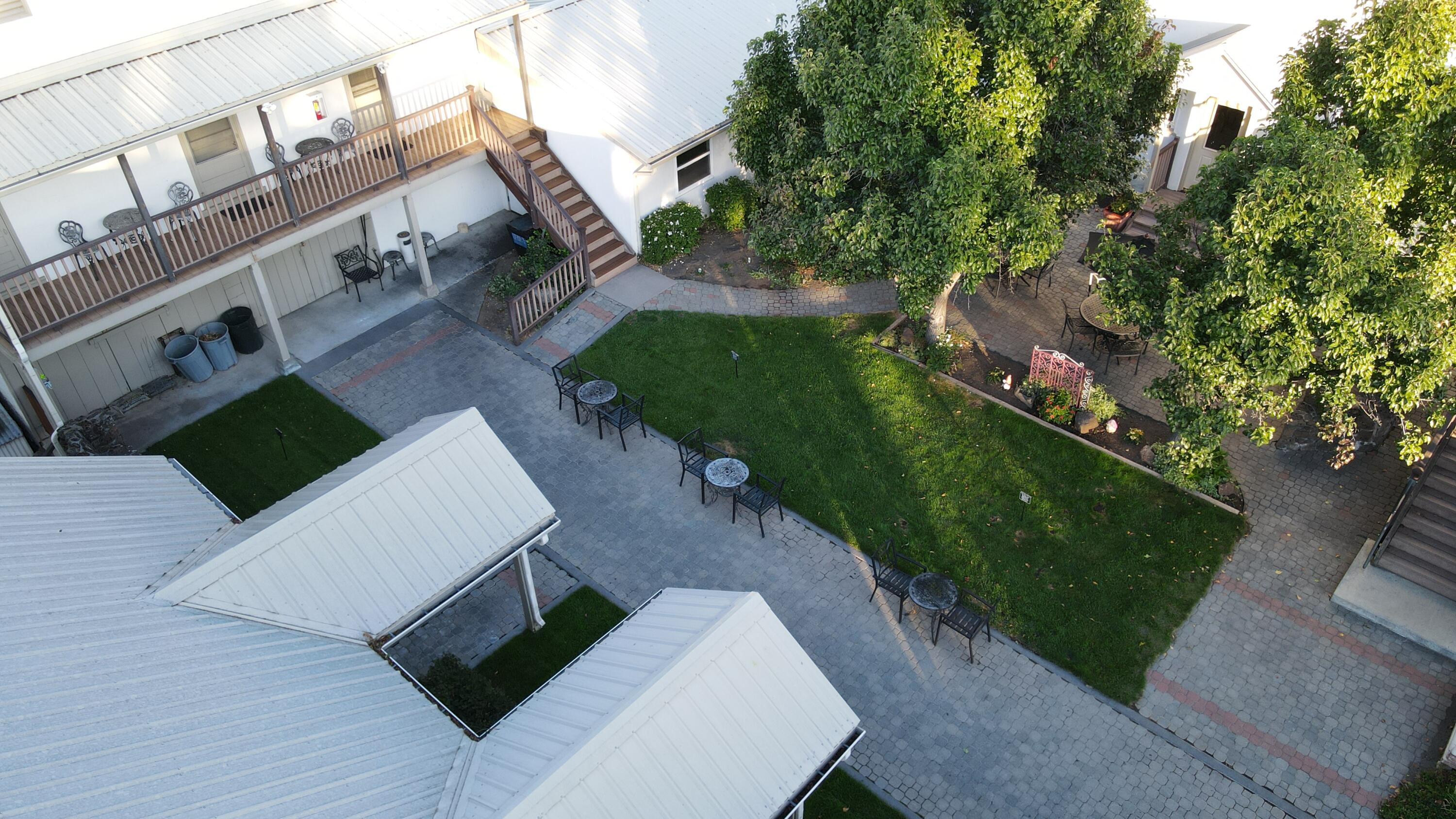 24860 Main Street Fall River Mills, CA 96028 - Photo 41 of 50 a view of a house with a yard