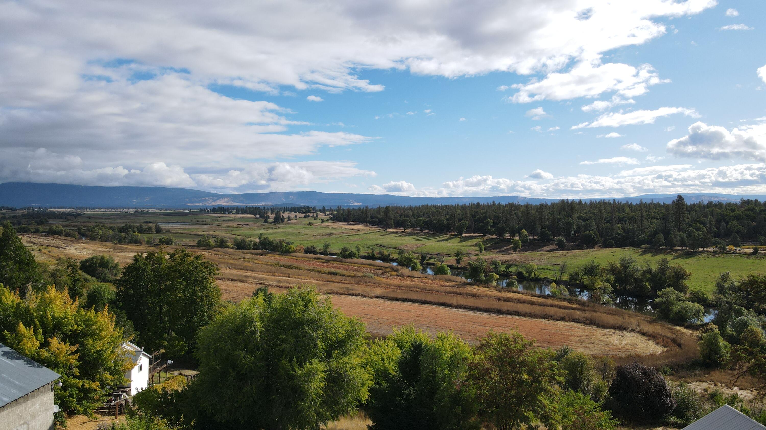 24860 Main Street Fall River Mills, CA 96028 - Photo 50 of 50 a view of a lake with a city