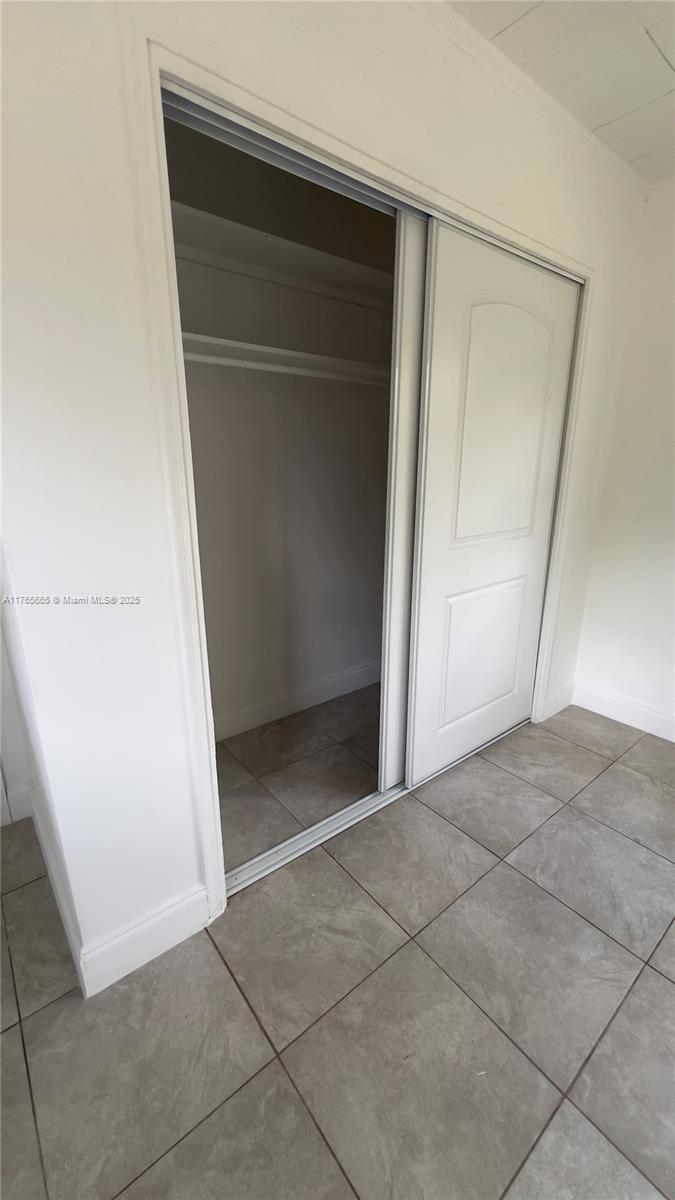 2008 North 47th Street Fort Pierce, FL 34947 - Photo 19 of 27 an empty room with wooden door