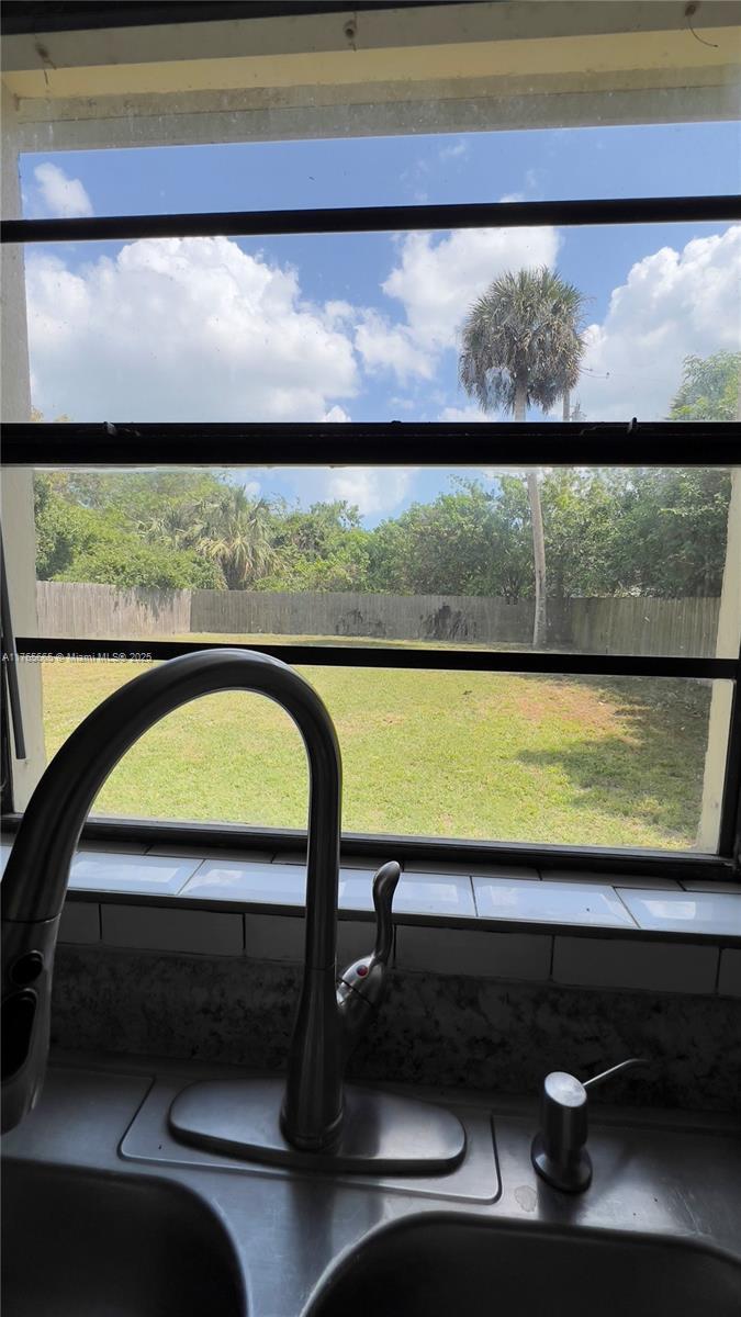 2008 North 47th Street Fort Pierce, FL 34947 - Photo 6 of 27 a view of swimming pool from a balcony