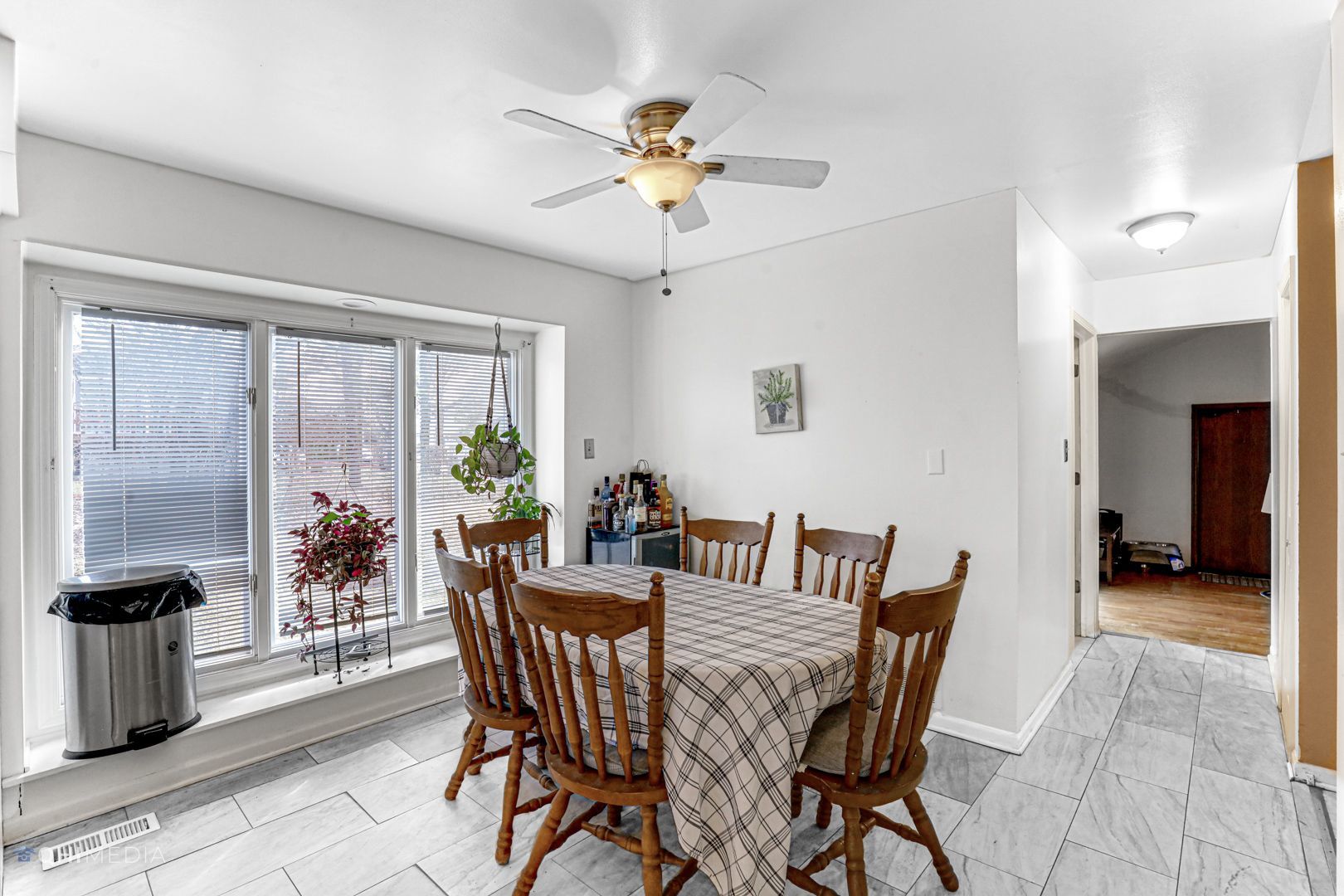 2930 Paris Road Olympia Fields, IL 60461 - Photo 11 of 27 a view of a dining room with furniture window and outside view
