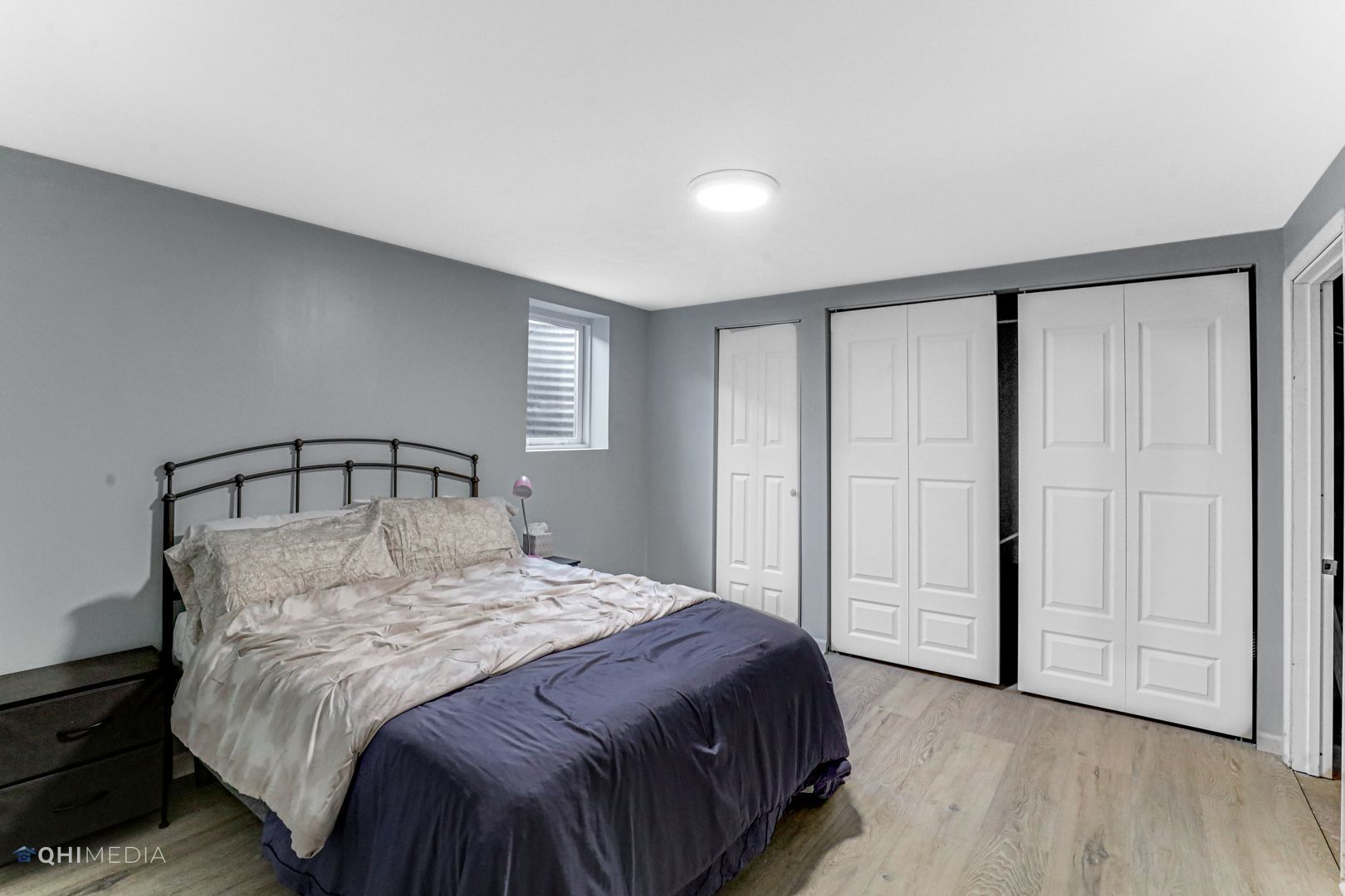 2930 Paris Road Olympia Fields, IL 60461 - Photo 22 of 27 a large bed sitting in a bedroom next to a bathroom