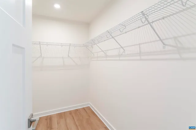 a view of a room with racks on the wall