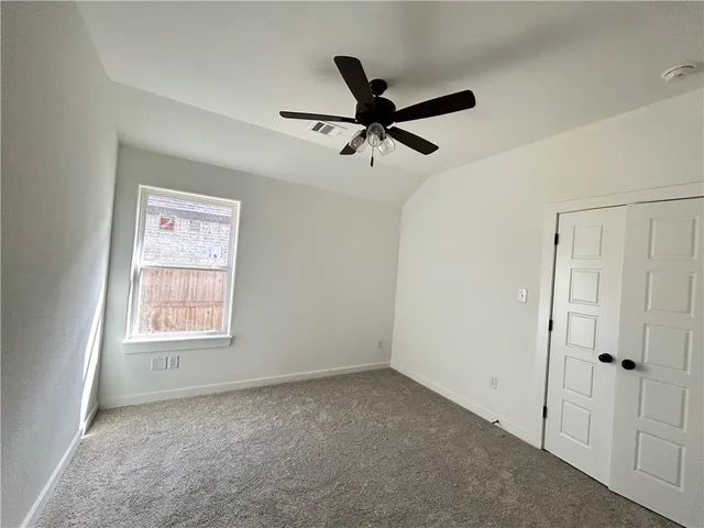 a view of a window in an empty room