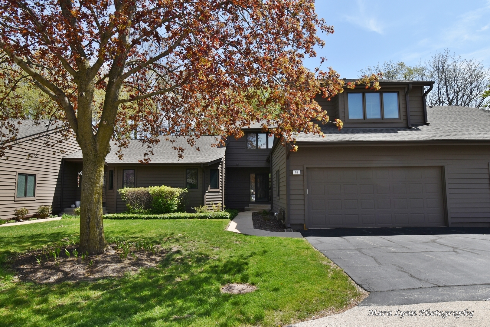 112 Sumac Court St. Charles, IL 60174 - Photo 1 of 37 a front view of a house with a yard and garage