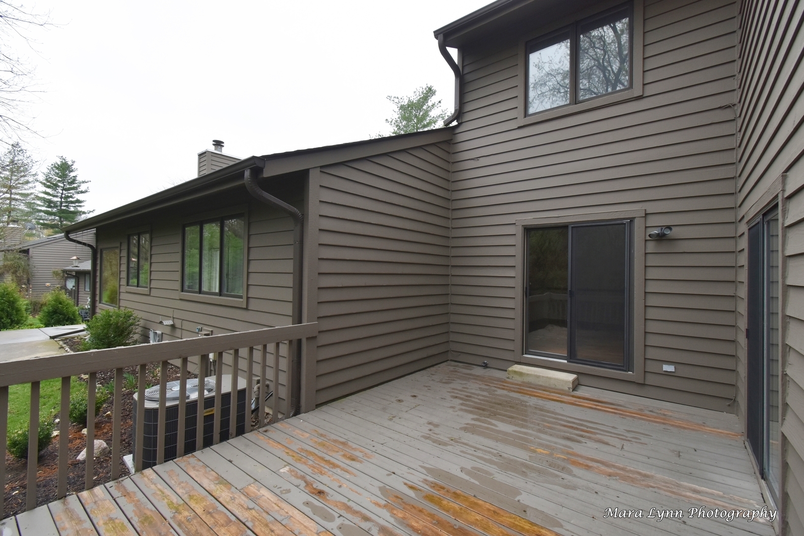 112 Sumac Court St. Charles, IL 60174 - Photo 35 of 37 a backyard of a house with wooden floor and fence