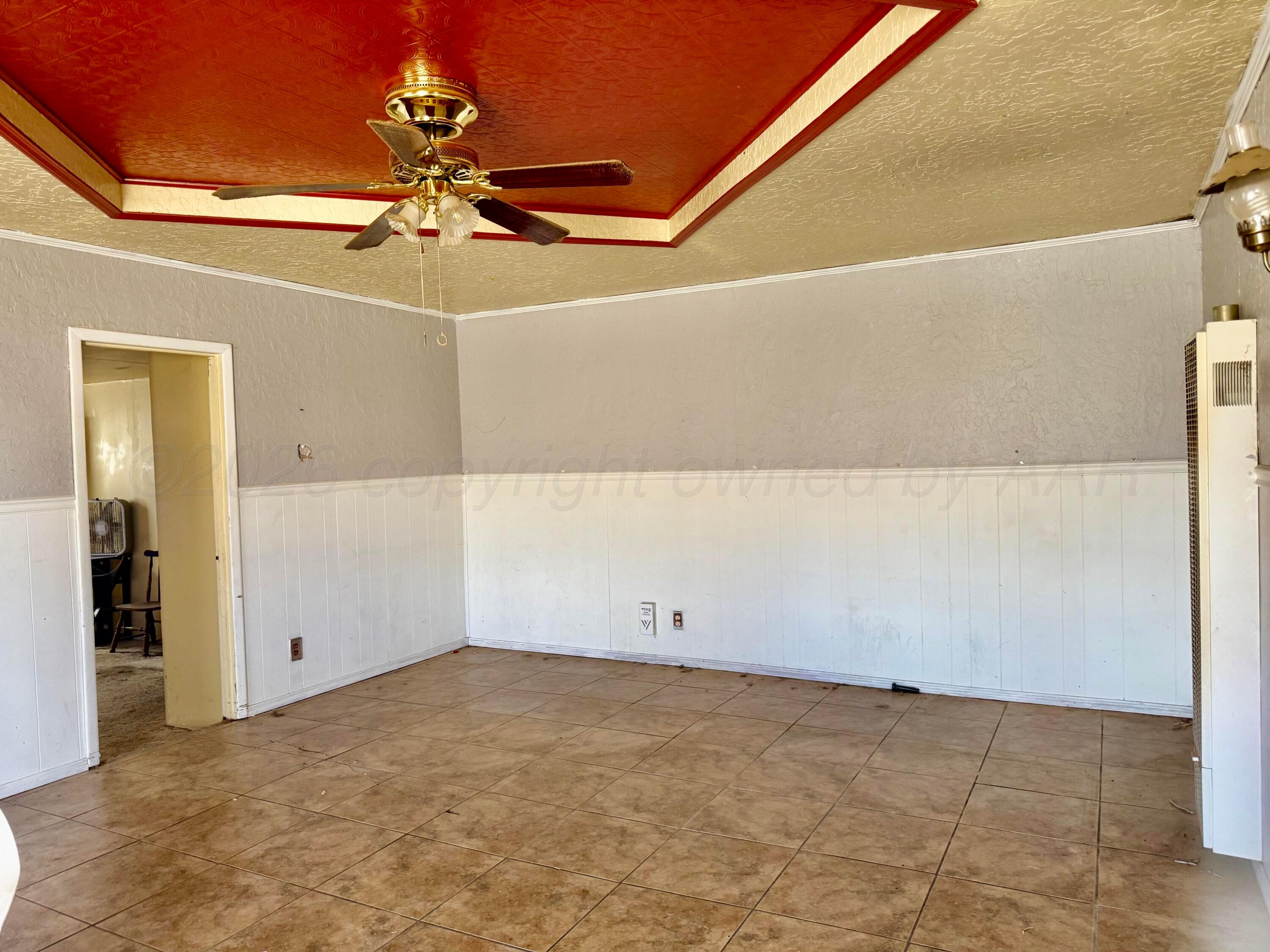 1518 South Williams Street Amarillo, TX 79102 - Photo 4 of 13 a view of a room with fan