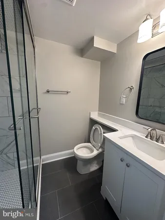 a view of deck with a large trees