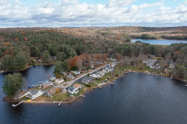 a view of a city street both side of river