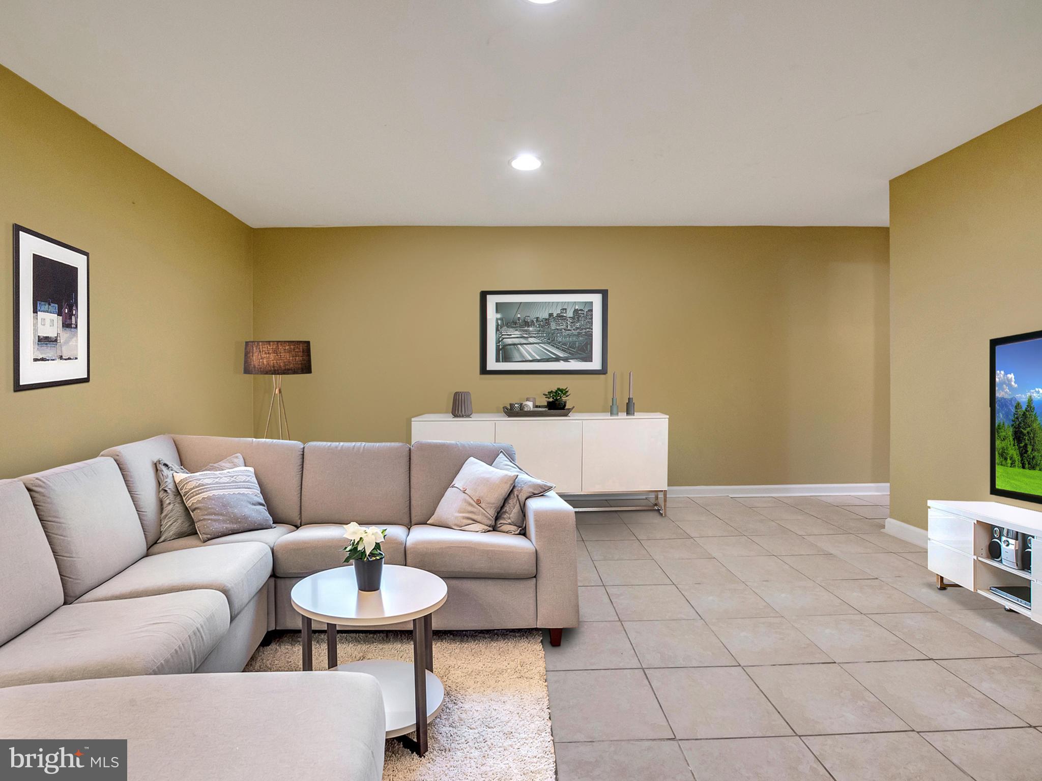 5812 Shookstown Road Frederick, MD 21702 - Photo 19 of 31 a living room with furniture and a couch
