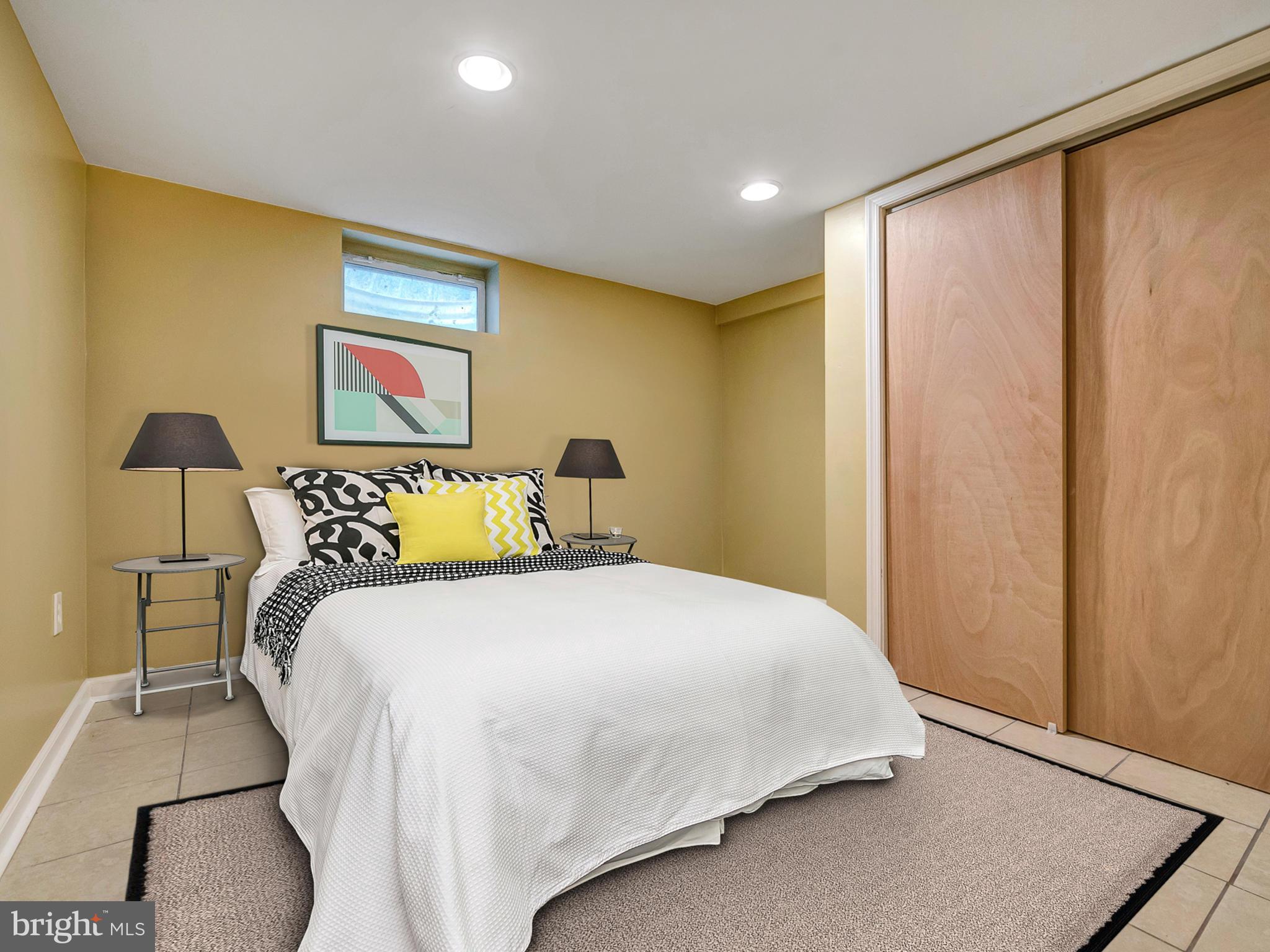 5812 Shookstown Road Frederick, MD 21702 - Photo 21 of 31 a bedroom with a bed and wooden floor