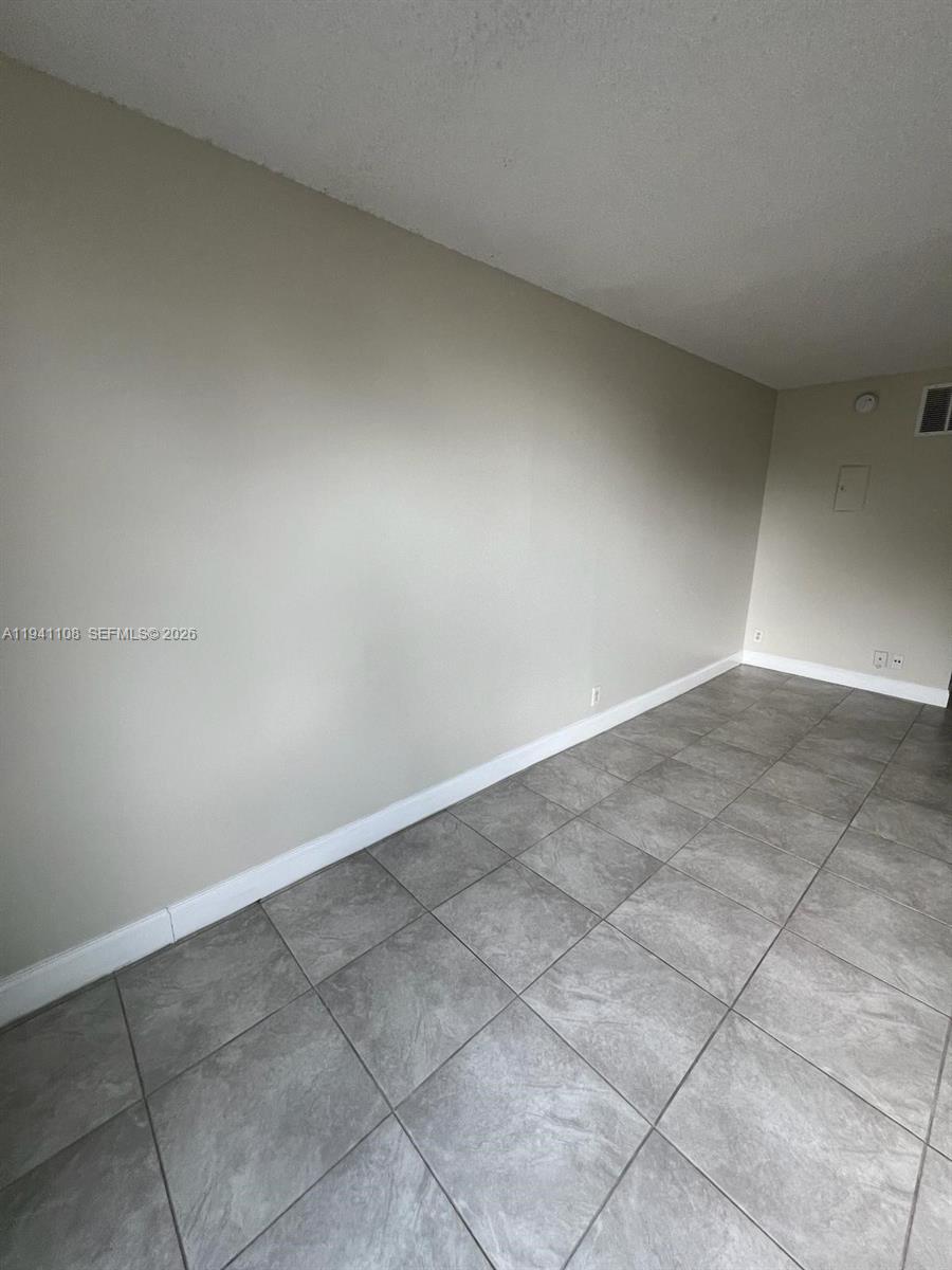 2701 Riverside Drive, Unit 308B Coral Springs, FL 33065 - Photo 8 of 9 a view of an empty room