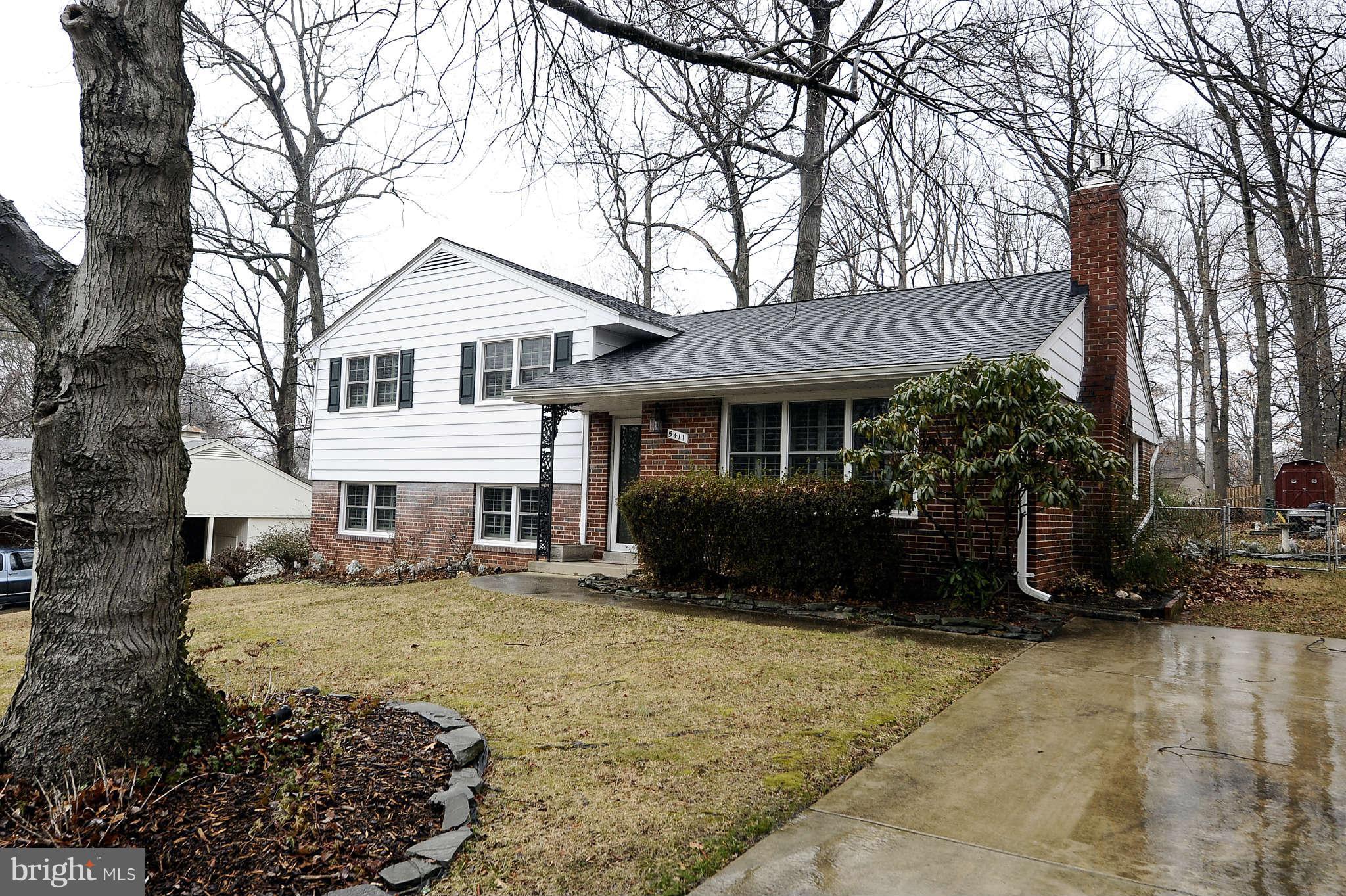 5411 Inverchapel Road Springfield, VA 22151 - Photo 2 of 22 a front view of a house with a yard