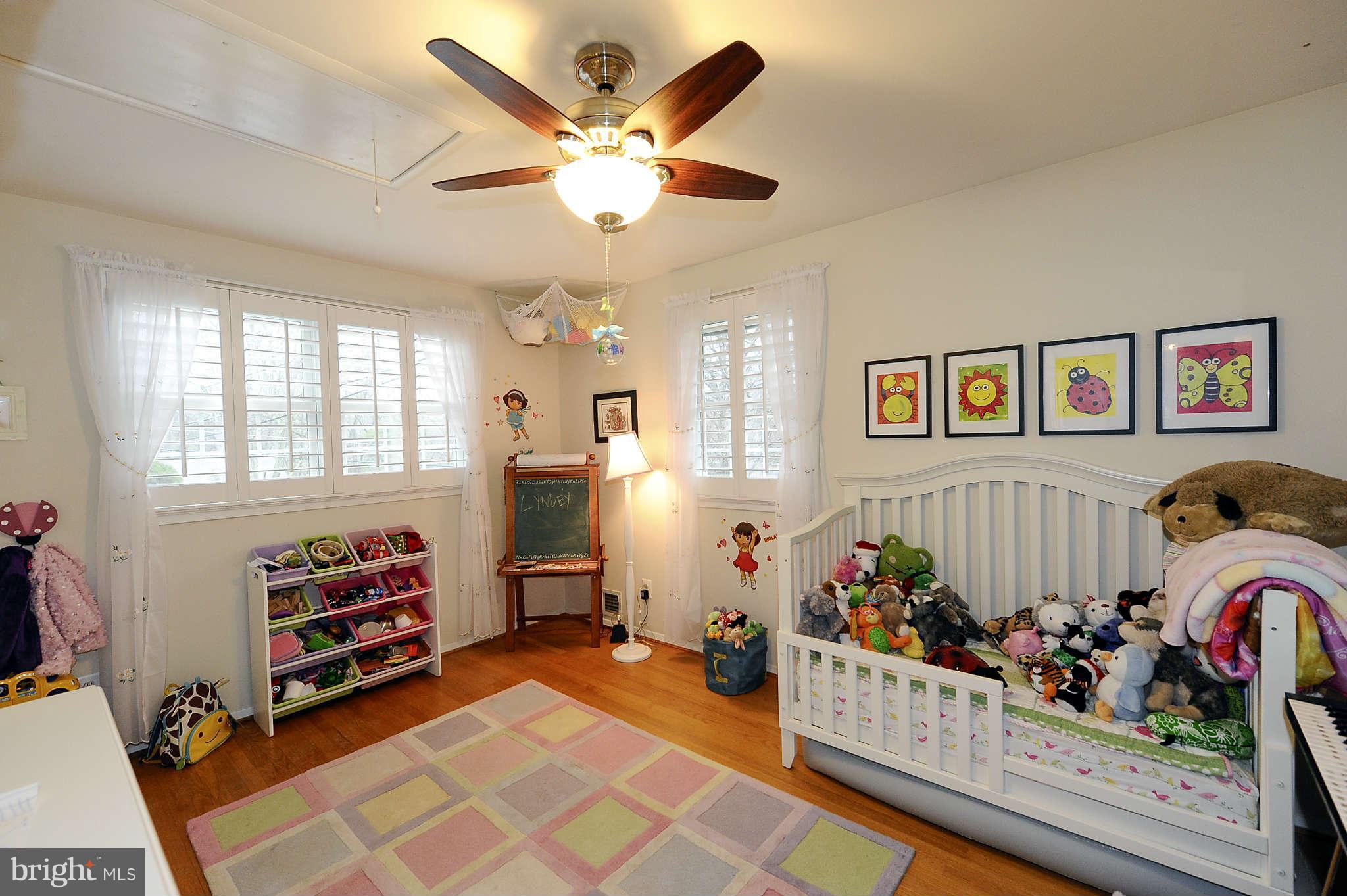 5411 Inverchapel Road Springfield, VA 22151 - Photo 14 of 22 a bed room with furniture and a window