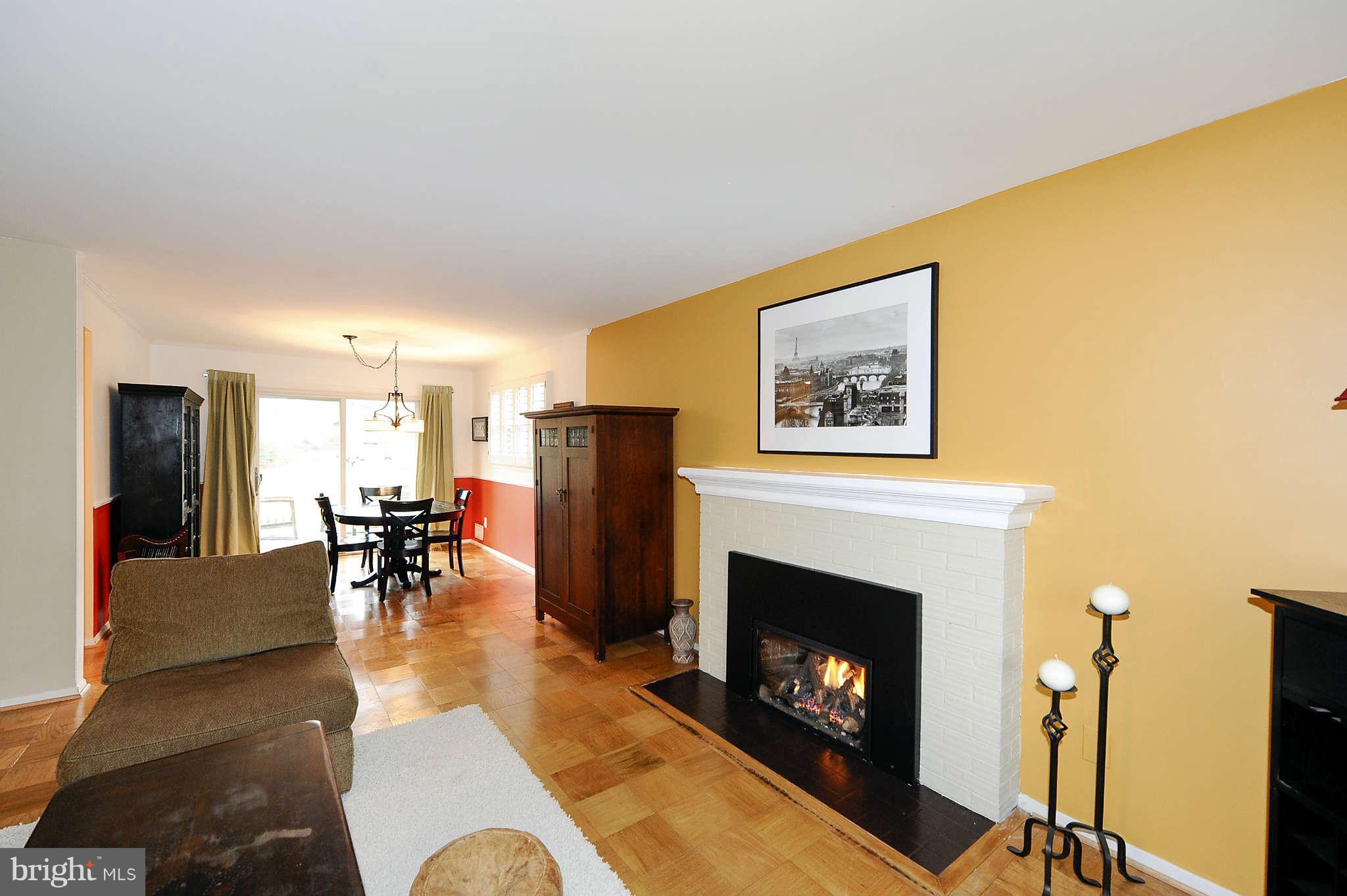 5411 Inverchapel Road Springfield, VA 22151 - Photo 5 of 22 a living room with furniture and a fireplace