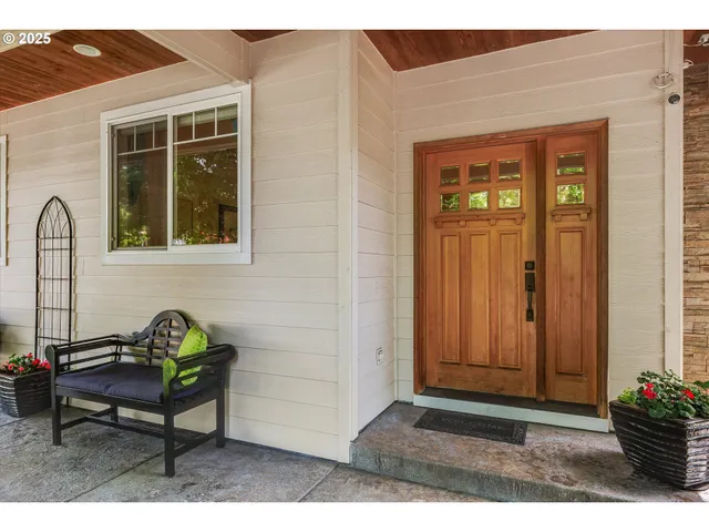 a view of a bench in front of house