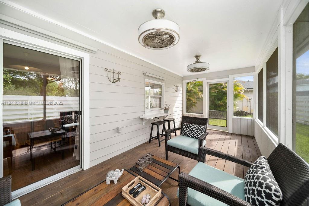 14914 Southwest 142nd Place Miami, FL 33186 - Photo 25 of 27 workspace with wooden floor and windows