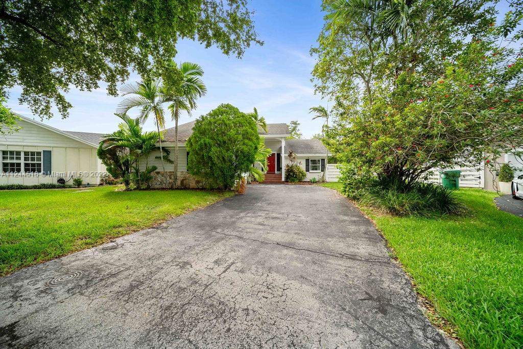 14914 Southwest 142nd Place Miami, FL 33186 - Photo 27 of 27 a view of a house with a yard