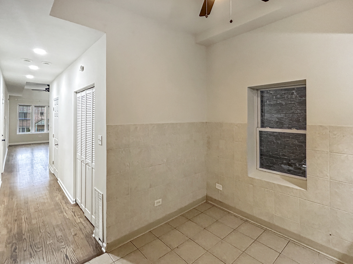 2953 West Warren Boulevard, Unit 2 Chicago, IL 60612 - Photo 12 of 31 a view of an empty room and window