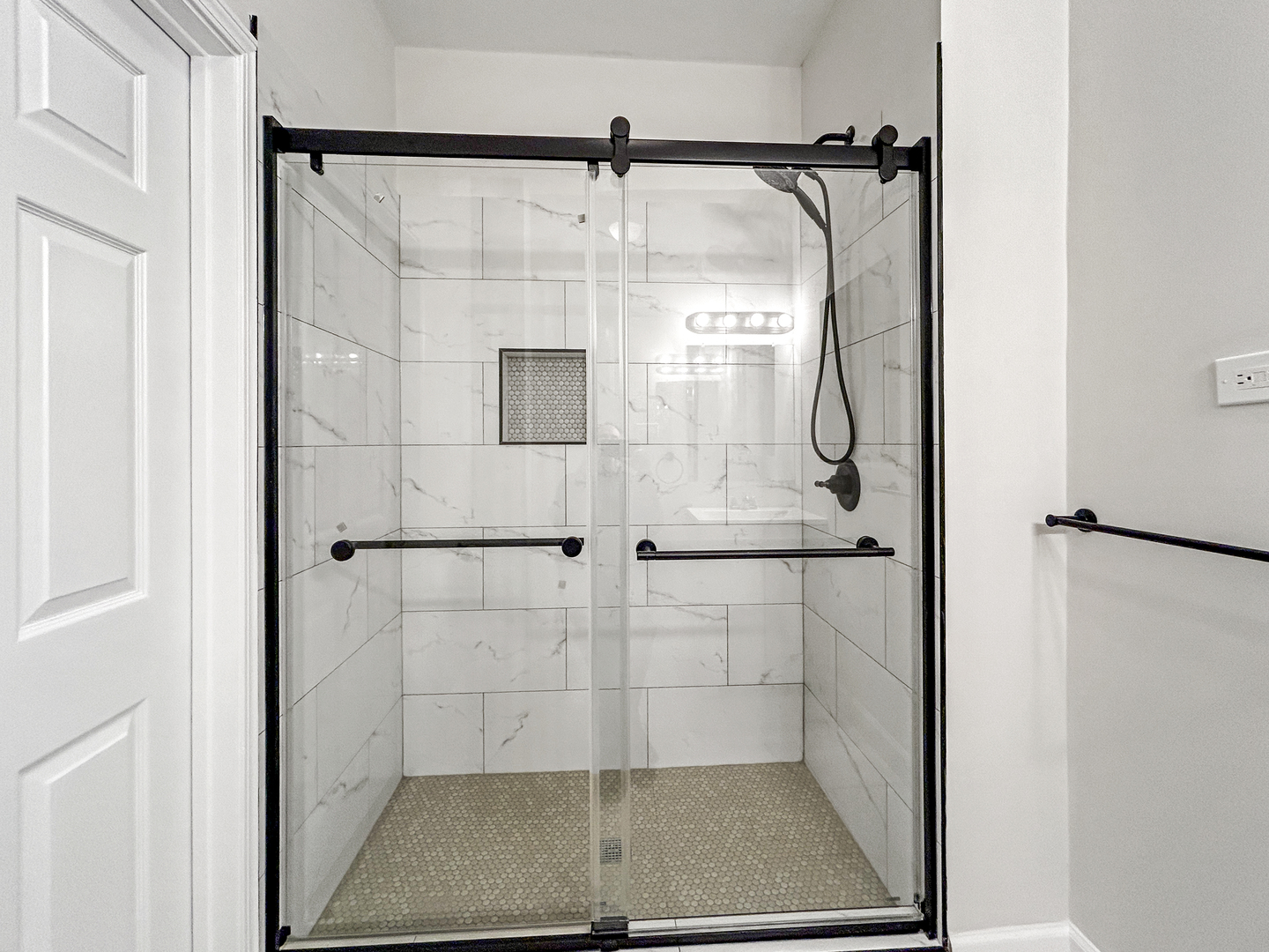2953 West Warren Boulevard, Unit 2 Chicago, IL 60612 - Photo 13 of 31 a bathroom with a glass shower door