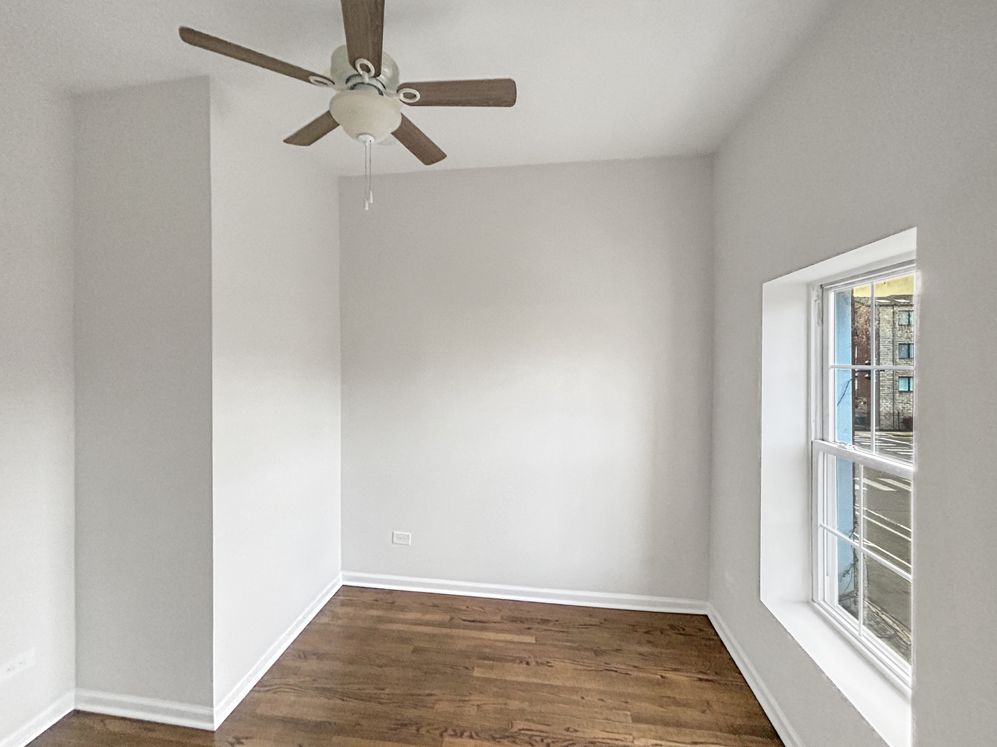 2953 West Warren Boulevard, Unit 2 Chicago, IL 60612 - Photo 23 of 31 a view of an empty room with a window