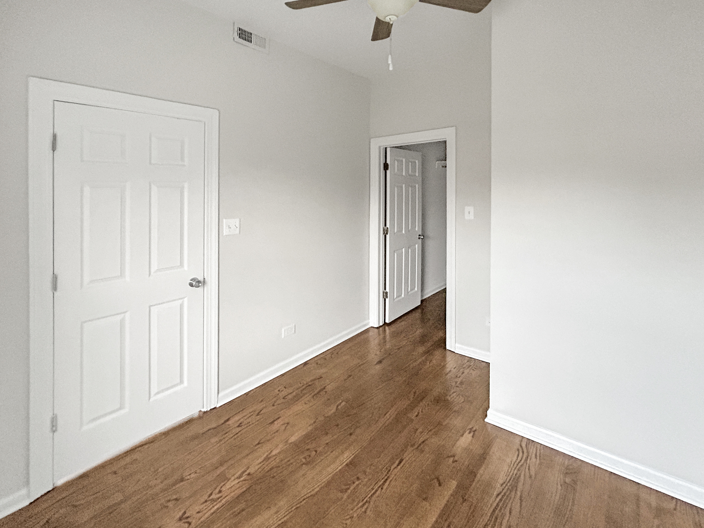 2953 West Warren Boulevard, Unit 2 Chicago, IL 60612 - Photo 8 of 31 a view of a hallway with wooden floor