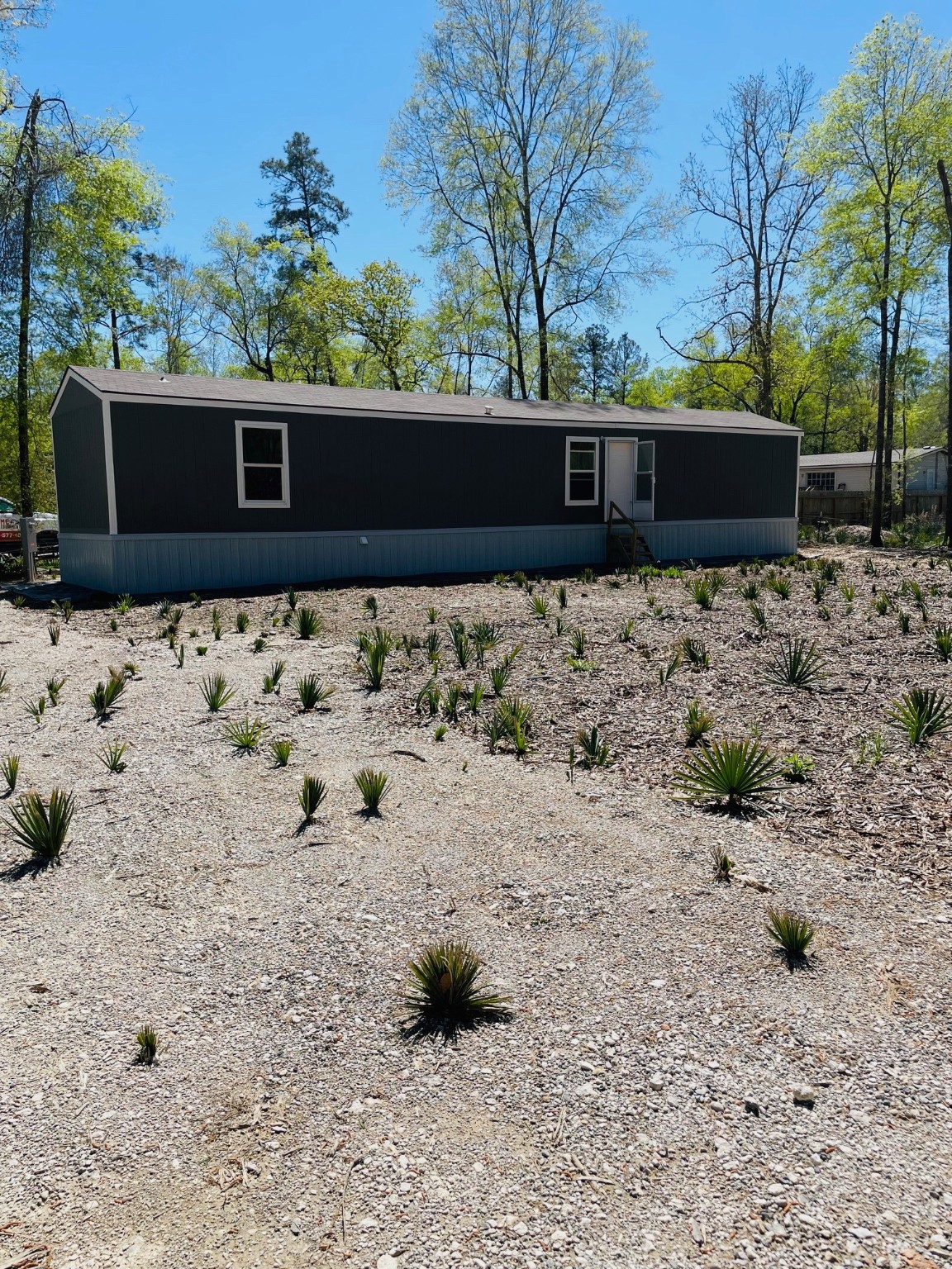 30 Hellon Lane Shepherd, TX 77371 - Photo 14 of 14 a view of a house with a yard covered with snow