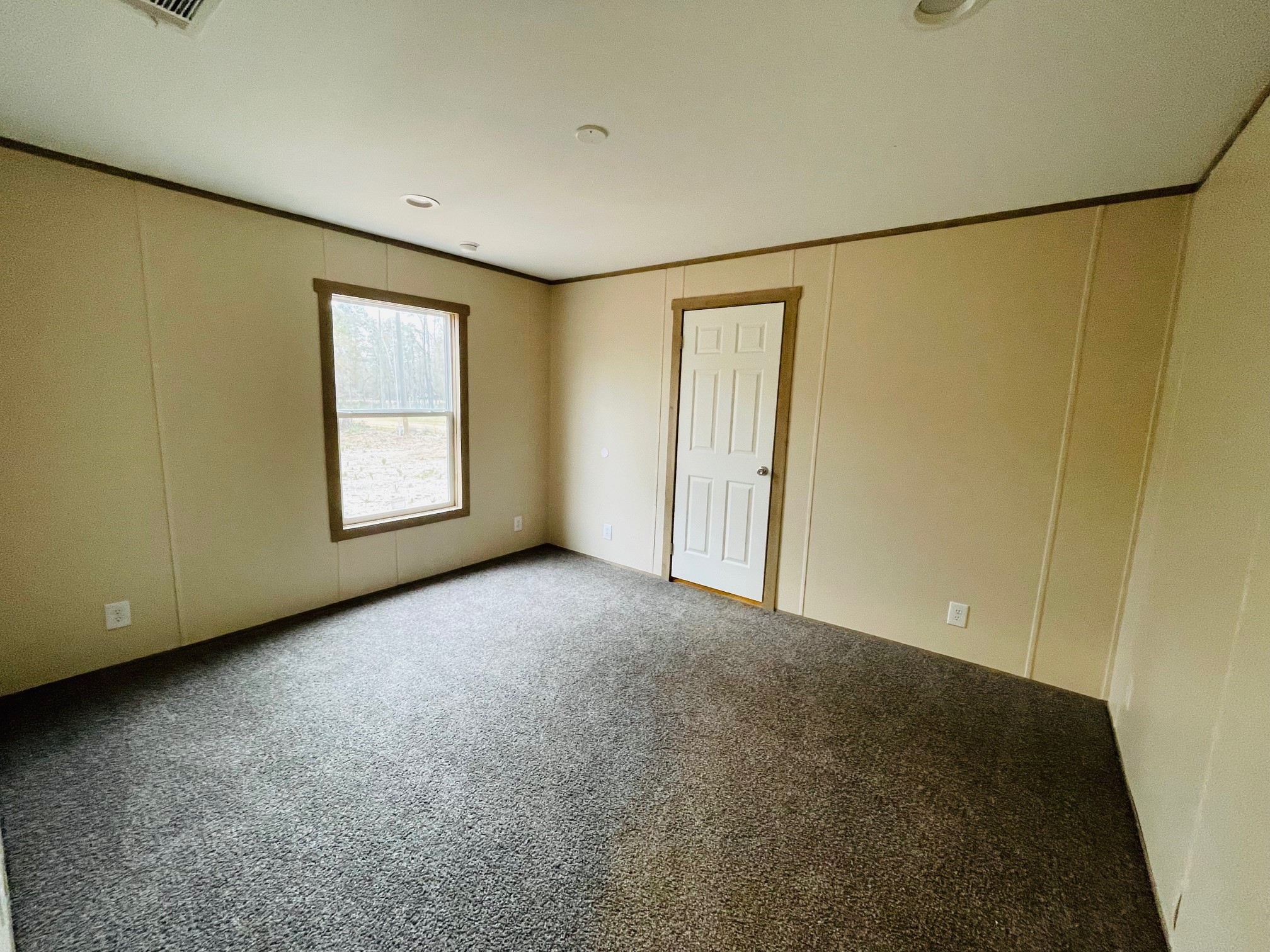 30 Hellon Lane Shepherd, TX 77371 - Photo 2 of 14 a view of an empty room with a window
