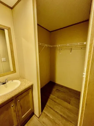 an empty room with a wooden door