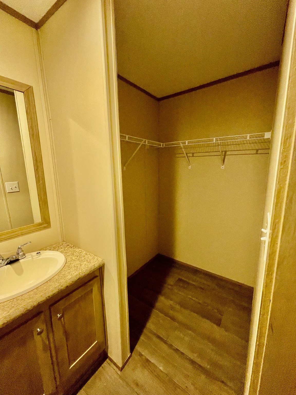 30 Hellon Lane Shepherd, TX 77371 - Photo 7 of 14 a bathroom with a sink and a mirror