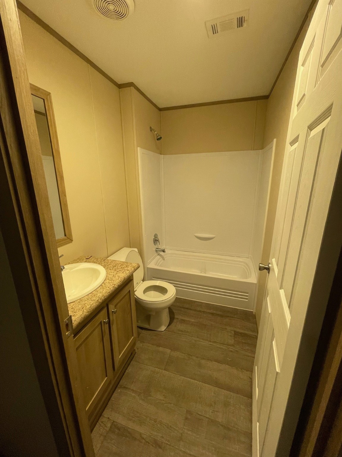 30 Hellon Lane Shepherd, TX 77371 - Photo 9 of 14 a bathroom with sink toilet and shower