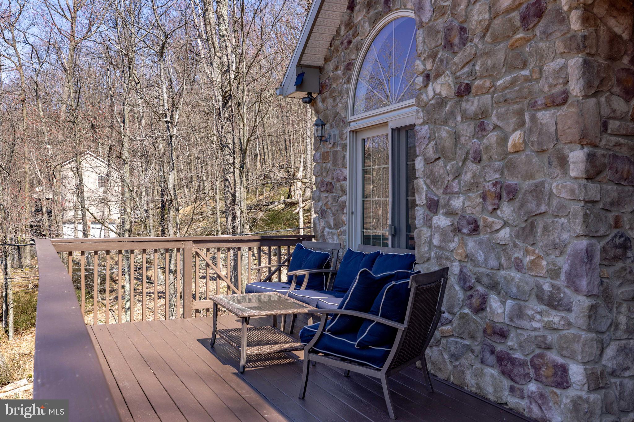154 Kickapoo Drive Hazleton, PA 18202 - Photo 5 of 86 Serene deck with forest views.