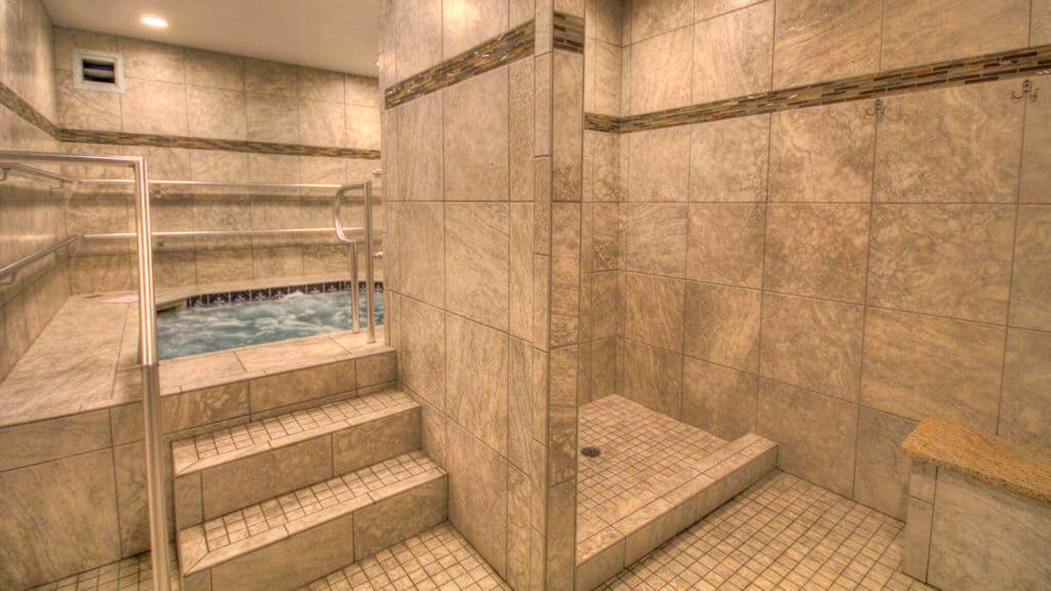 909 Santa Rosa Boulevard, Unit 319 Fort Walton Beach, FL 32548 - Photo 37 of 39 a bathroom with a tub and shower