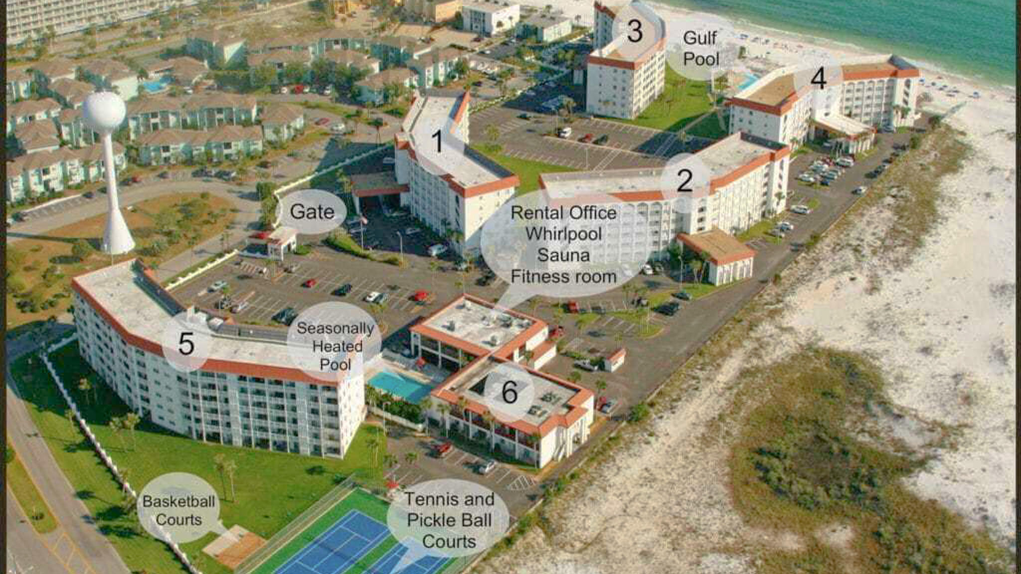909 Santa Rosa Boulevard, Unit 319 Fort Walton Beach, FL 32548 - Photo 39 of 39 an aerial view of a residential apartment building with a yard