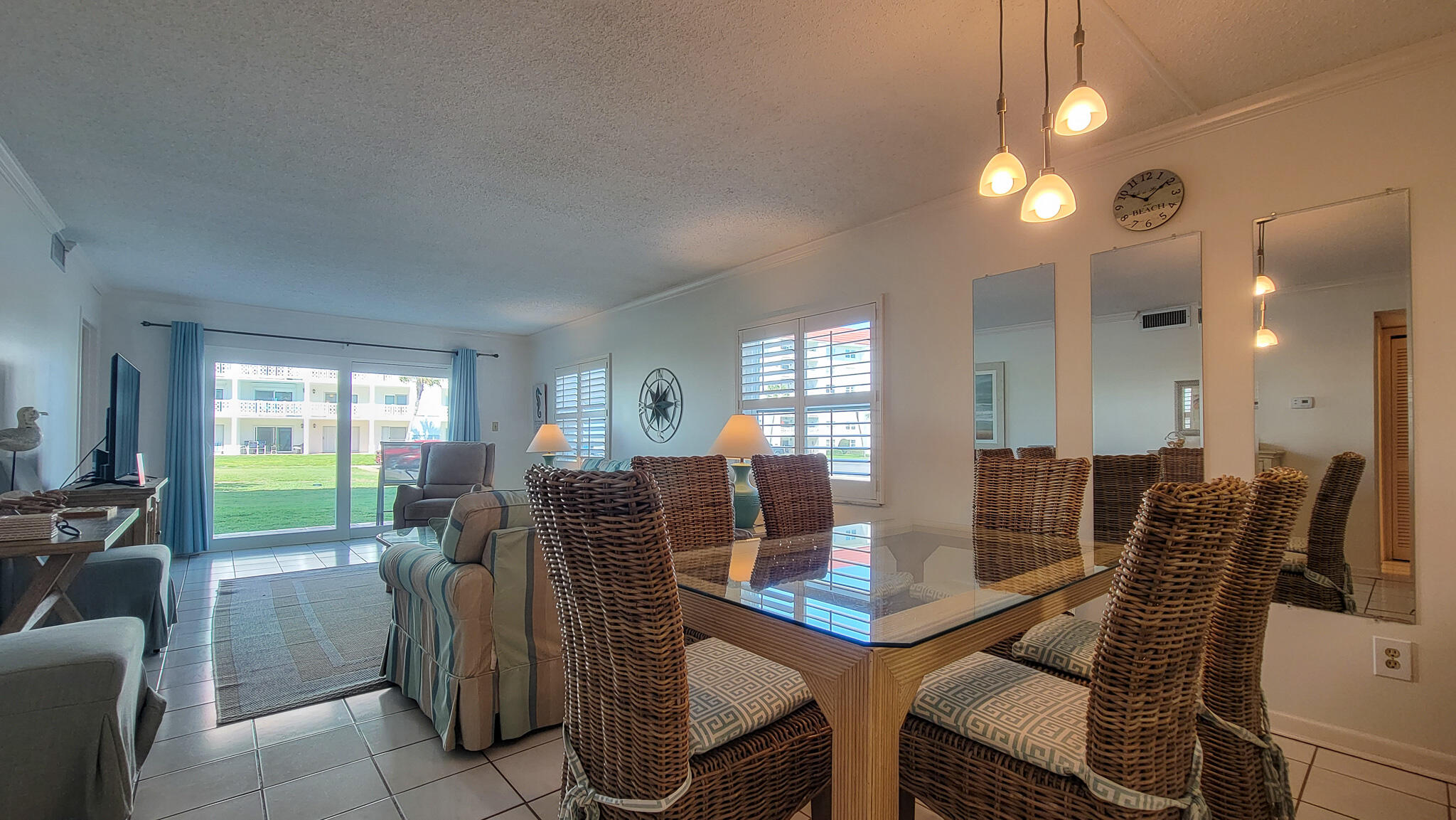 909 Santa Rosa Boulevard, Unit 319 Fort Walton Beach, FL 32548 - Photo 6 of 39 a view of a dining room with furniture and window