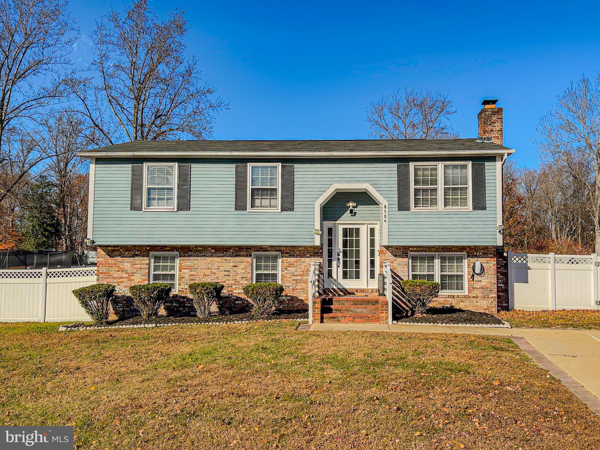 8504 Heatherwick Drive Brandywine, MD 20613 - Photo 2 of 51 a front view of a house with garden