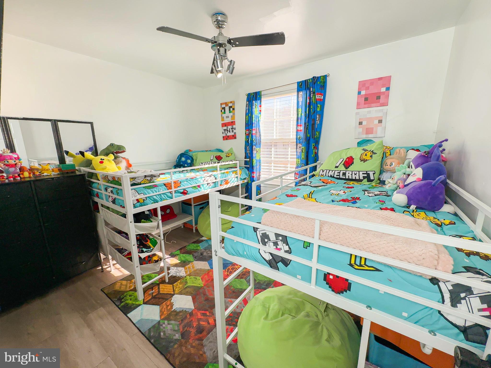 8504 Heatherwick Drive Brandywine, MD 20613 - Photo 27 of 51 a bedroom with toys and a wooden floor