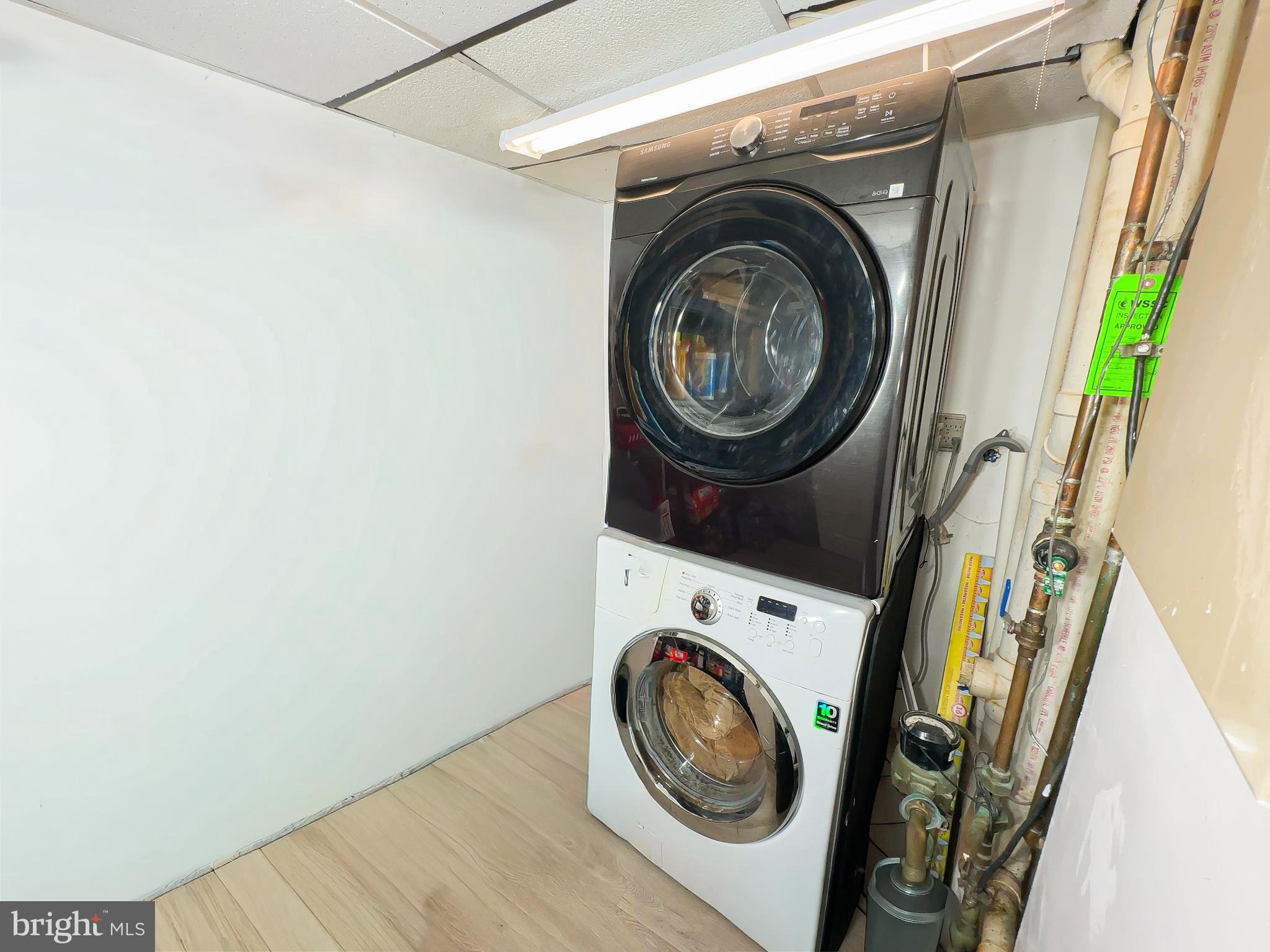 8504 Heatherwick Drive Brandywine, MD 20613 - Photo 35 of 51 a utility room with dryer and washer