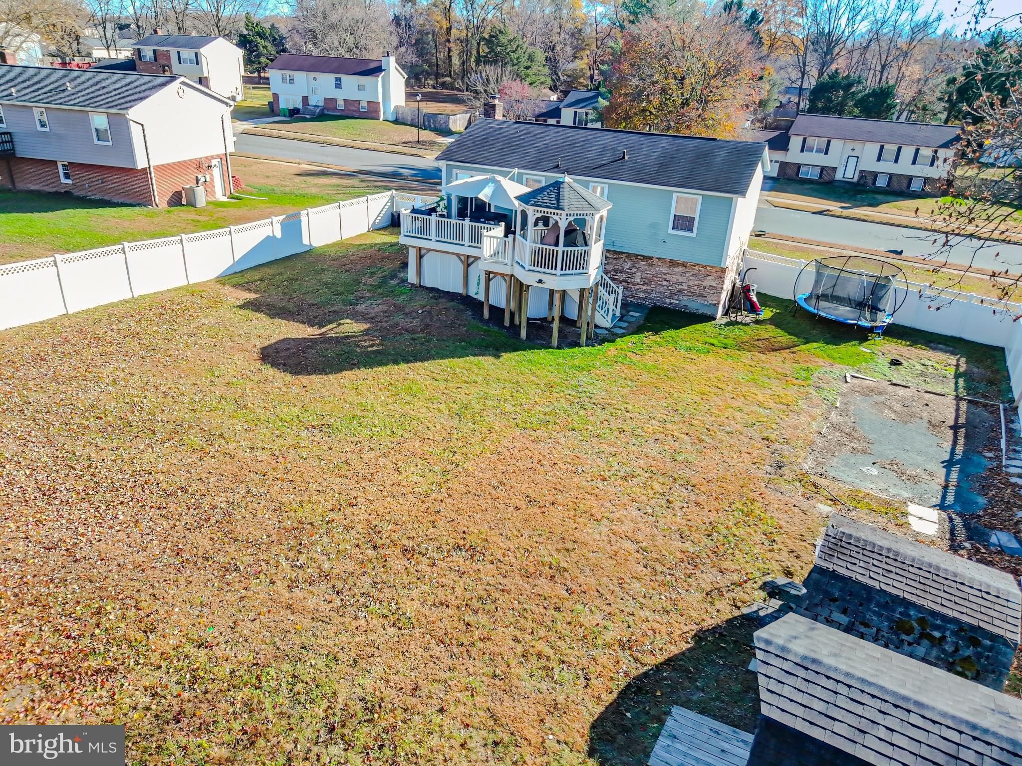8504 Heatherwick Drive Brandywine, MD 20613 - Photo 40 of 51 a view of a house with pool and chairs next to a yard